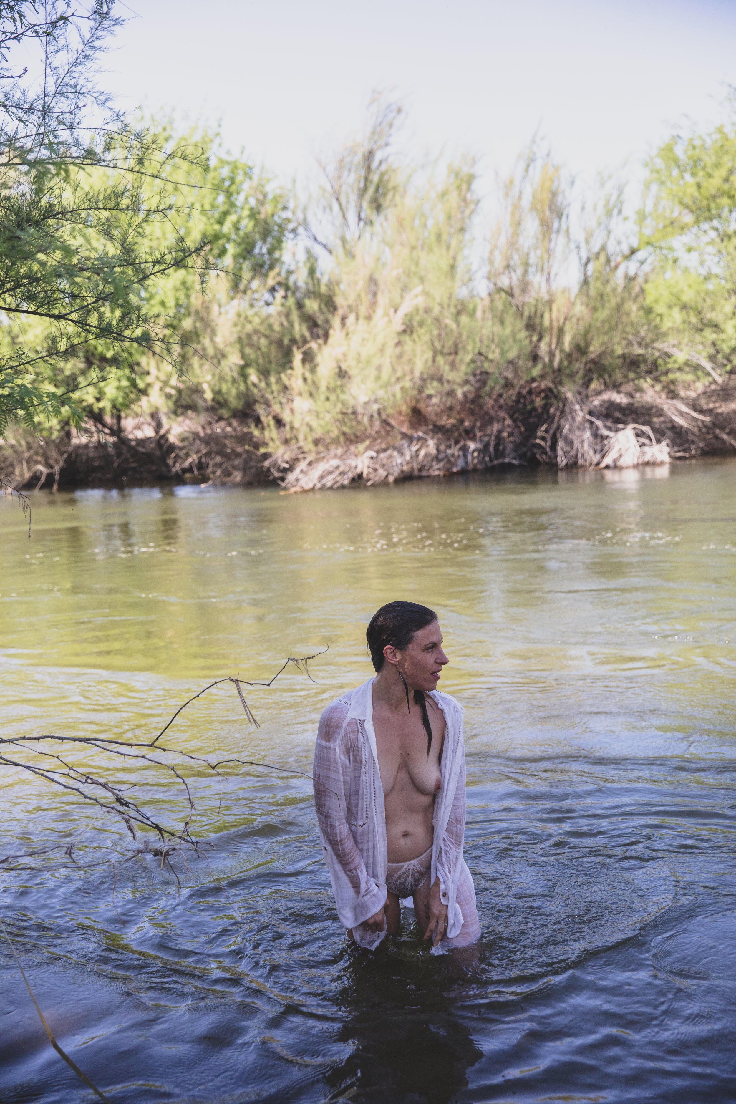 Woman poses for non-traditional boudoir photography in Salt River, Arizona, by Phoenix Boudoir Photographer Jennifer Lind Schutsky