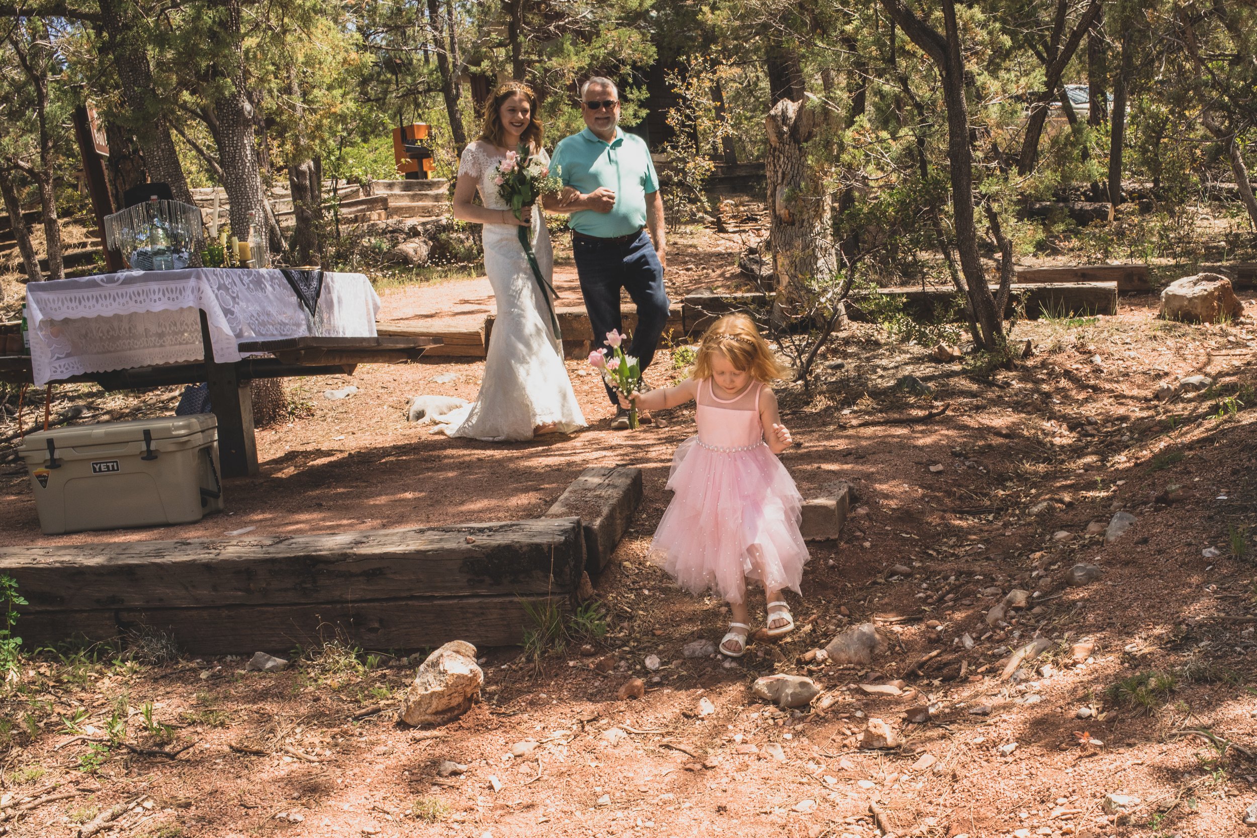 Family on wedding day at their high noon desert elopement in Payson, Arizona by Arizona Elopement Photographer Jennifer Lind Schutsky.