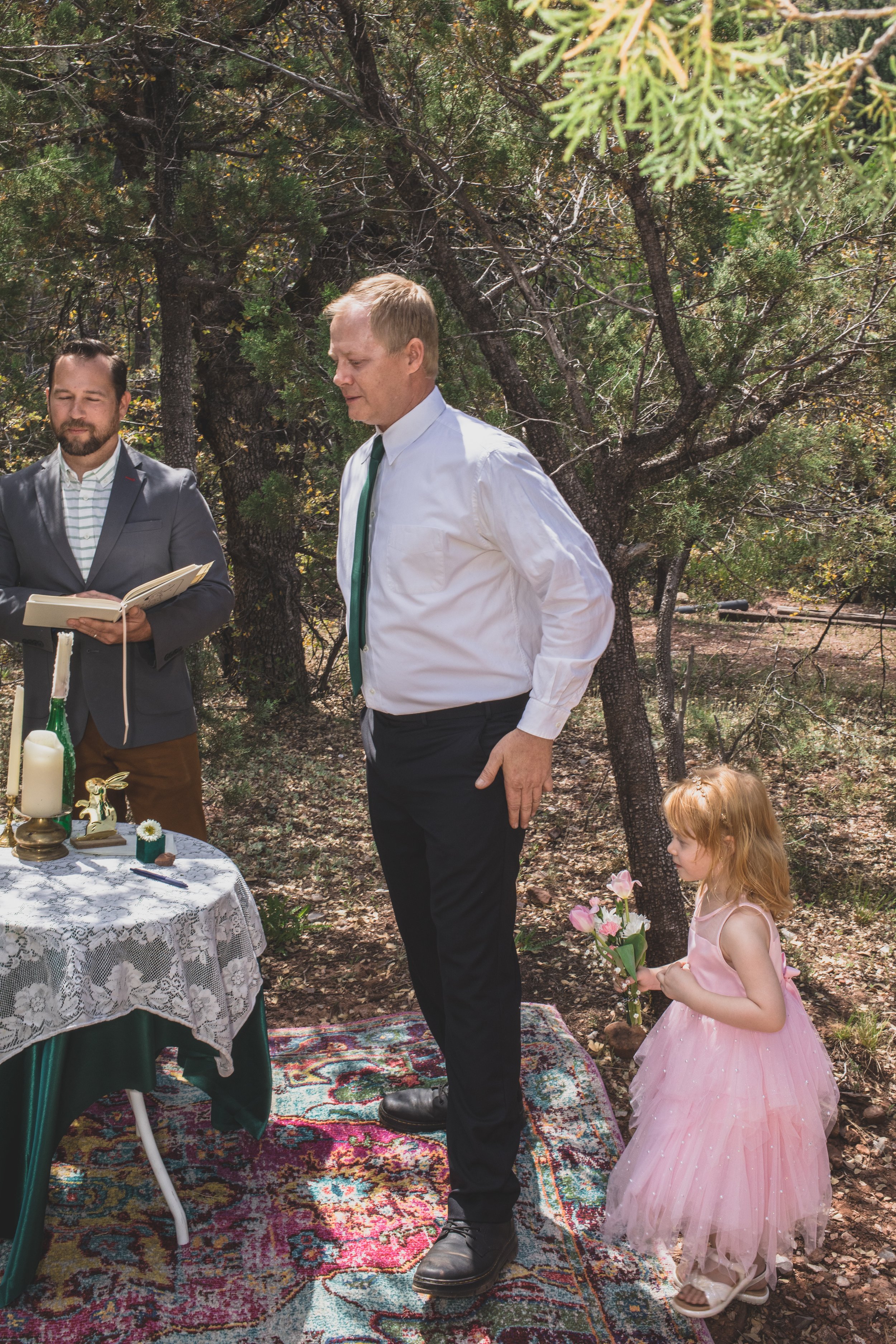 Groom and his daughter on his wedding day at their high noon desert elopement in Payson, Arizona by Arizona Elopement Photographer Jennifer Lind Schutsky.