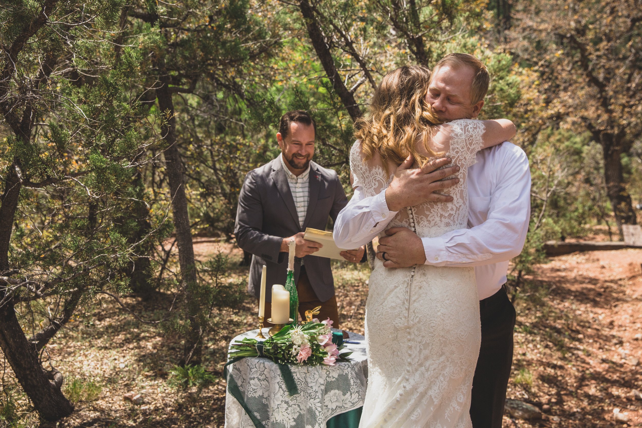 Newlyweds on their wedding day at their high noon desert elopement in Payson, Arizona by Arizona Elopement Photographer Jennifer Lind Schutsky.
