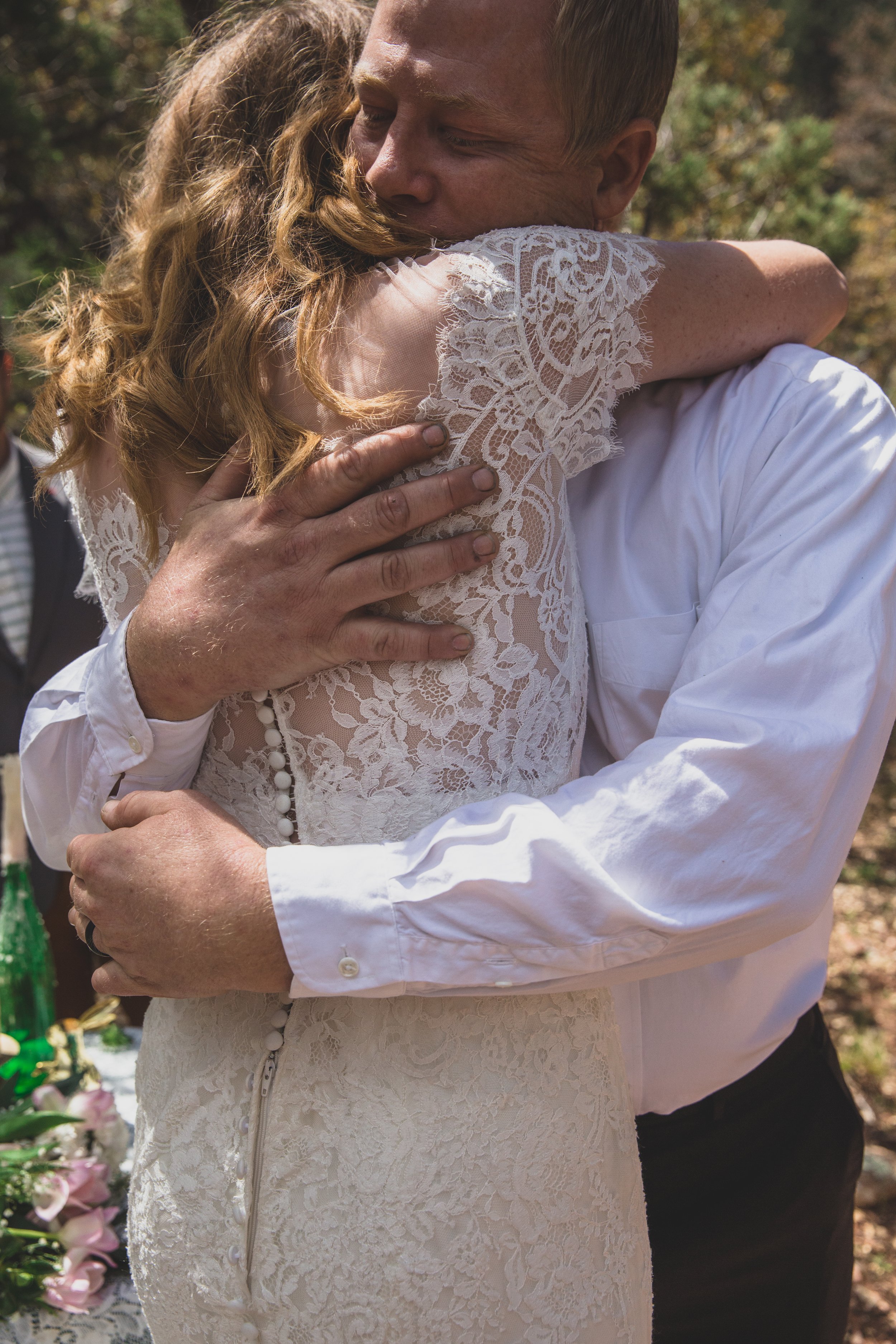 Newlyweds on their wedding day at their high noon desert elopement in Payson, Arizona by Arizona Elopement Photographer Jennifer Lind Schutsky.