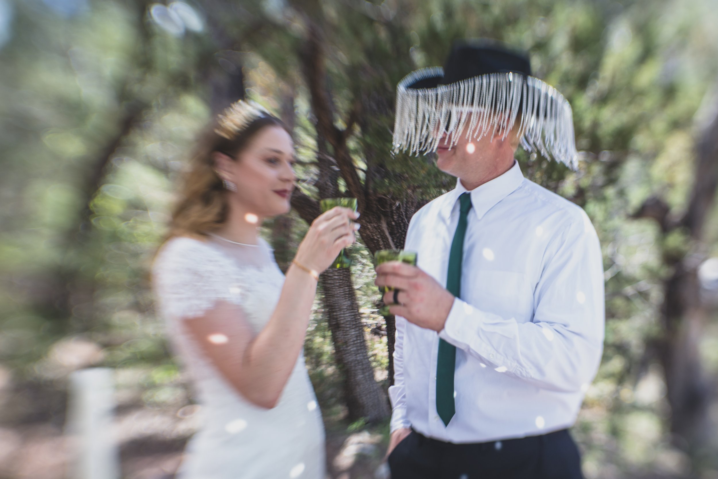 Newlyweds at their elopement reception in the Tonto National Forest in Payson, AZ by the best Arizona Elopement Photographer; Jennifer Lind Schutsky.