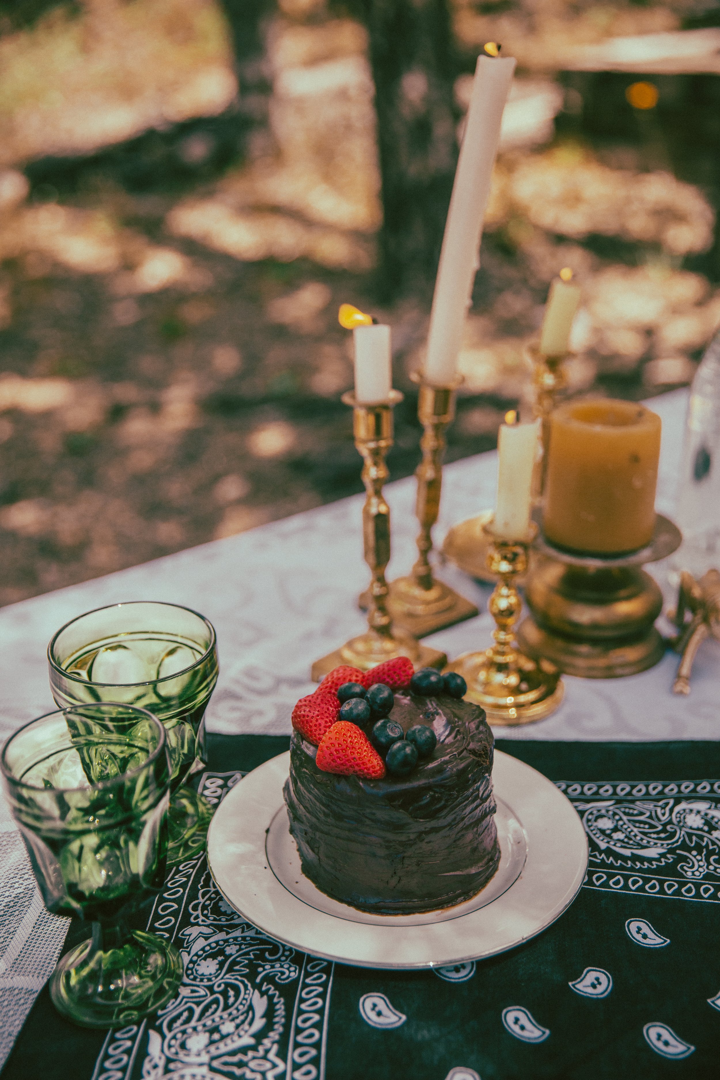 Elopement reception vintage green glass goblets and homemade cake details in the Tonto National Forest in Payson, AZ by the best Arizona Elopement Photographer; Jennifer Lind Schutsky.