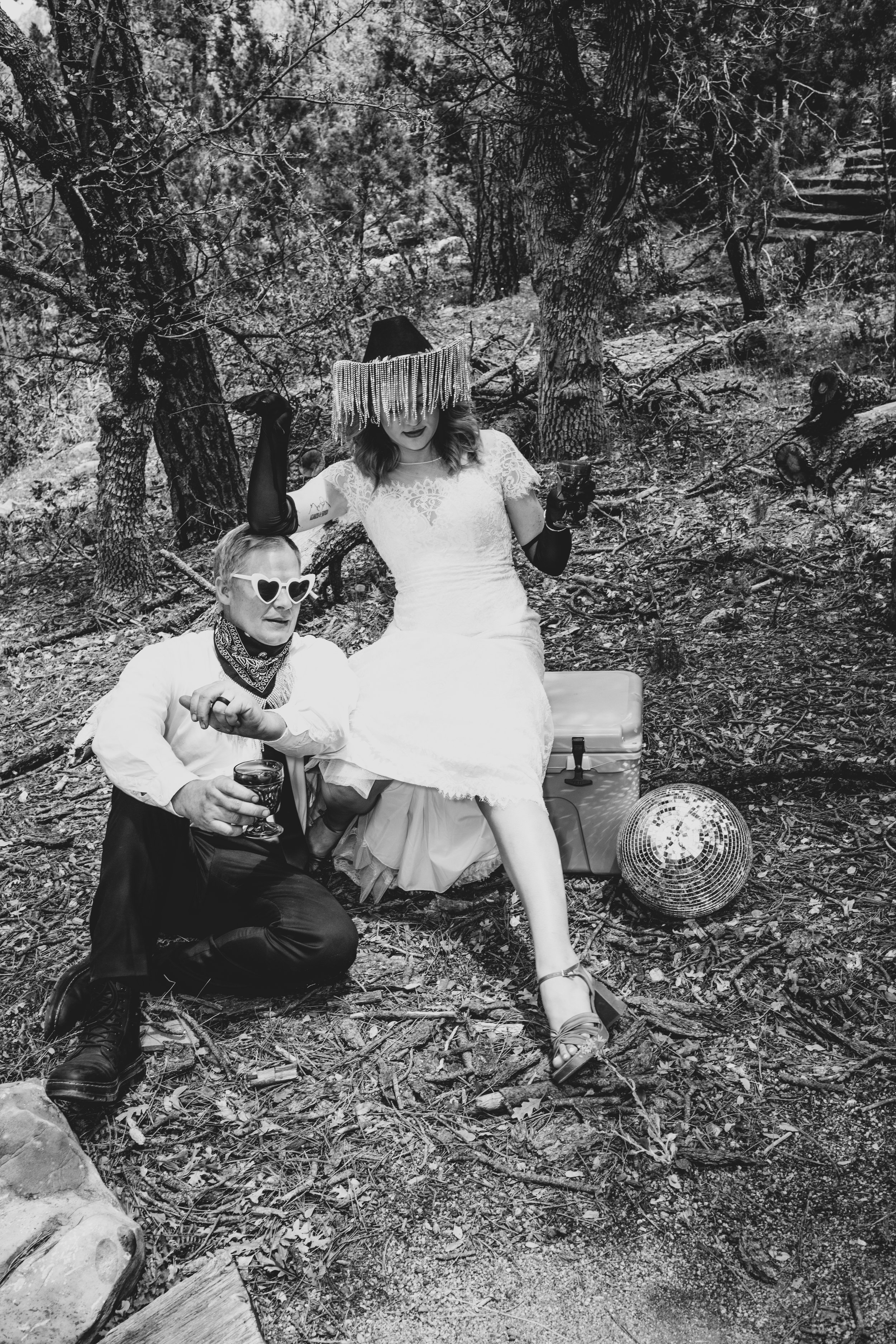 Couple poses for elopement reception in National Forest by all inclusive Arizona Elopement Photographer, Jennifer Lind Schutsky. 