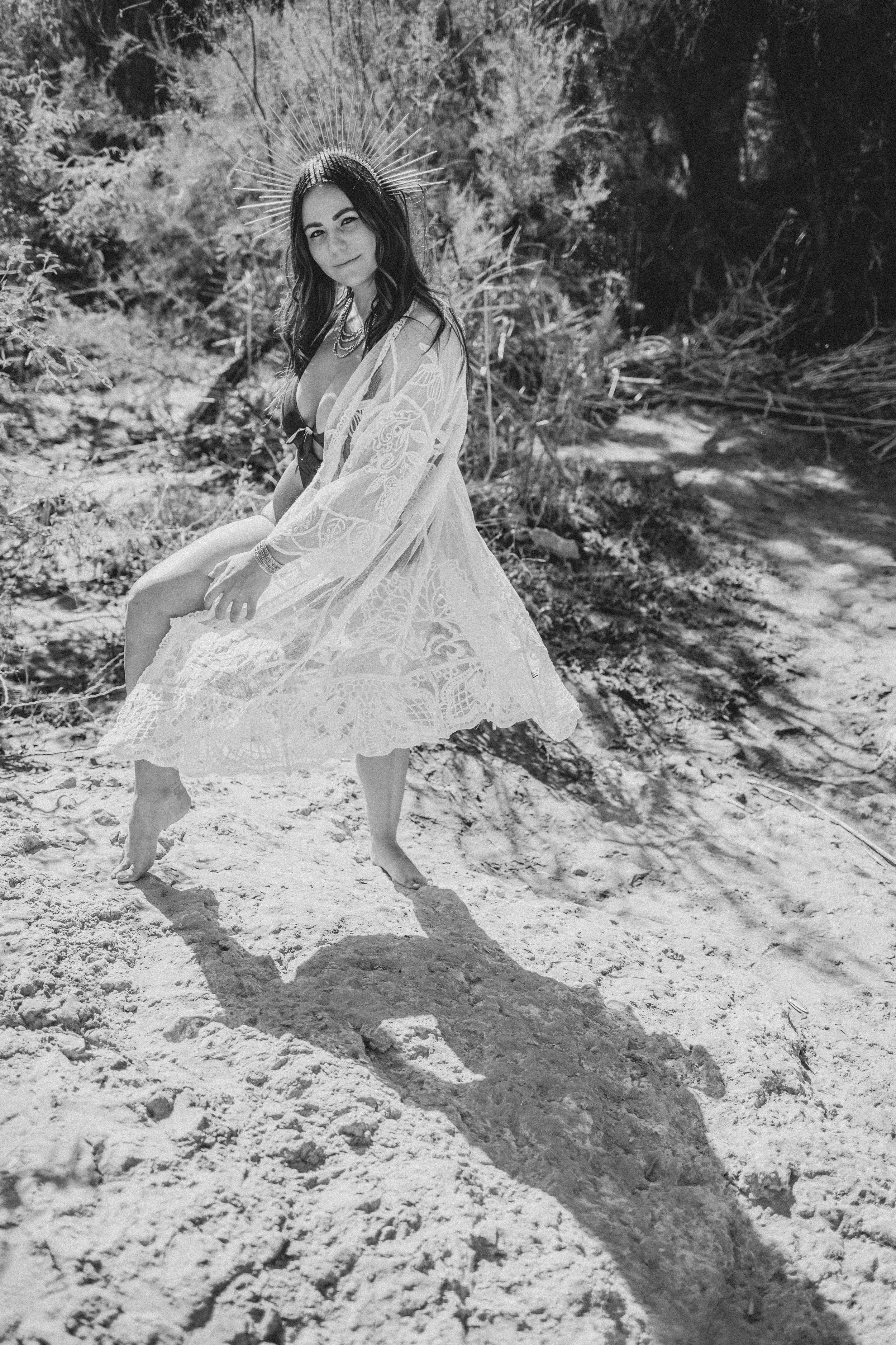 Woman poses for non-traditional boudoir photography at the Salt River, Arizona, by Phoenix Boudoir Photographer Jennifer Lind Schutsky.