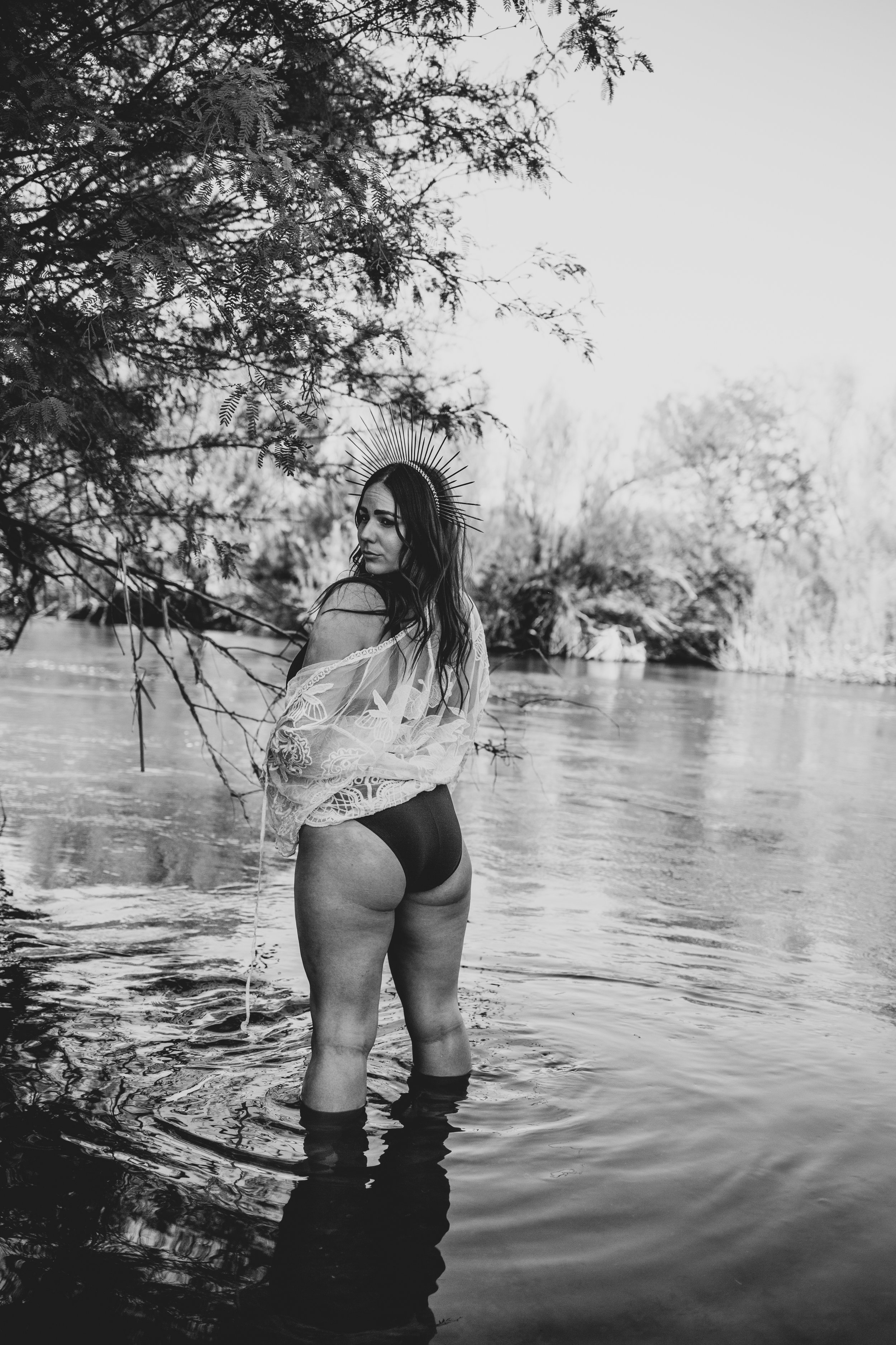 Woman poses for non-traditional boudoir photography at the Salt River, Arizona, by Phoenix Boudoir Photographer Jennifer Lind Schutsky.