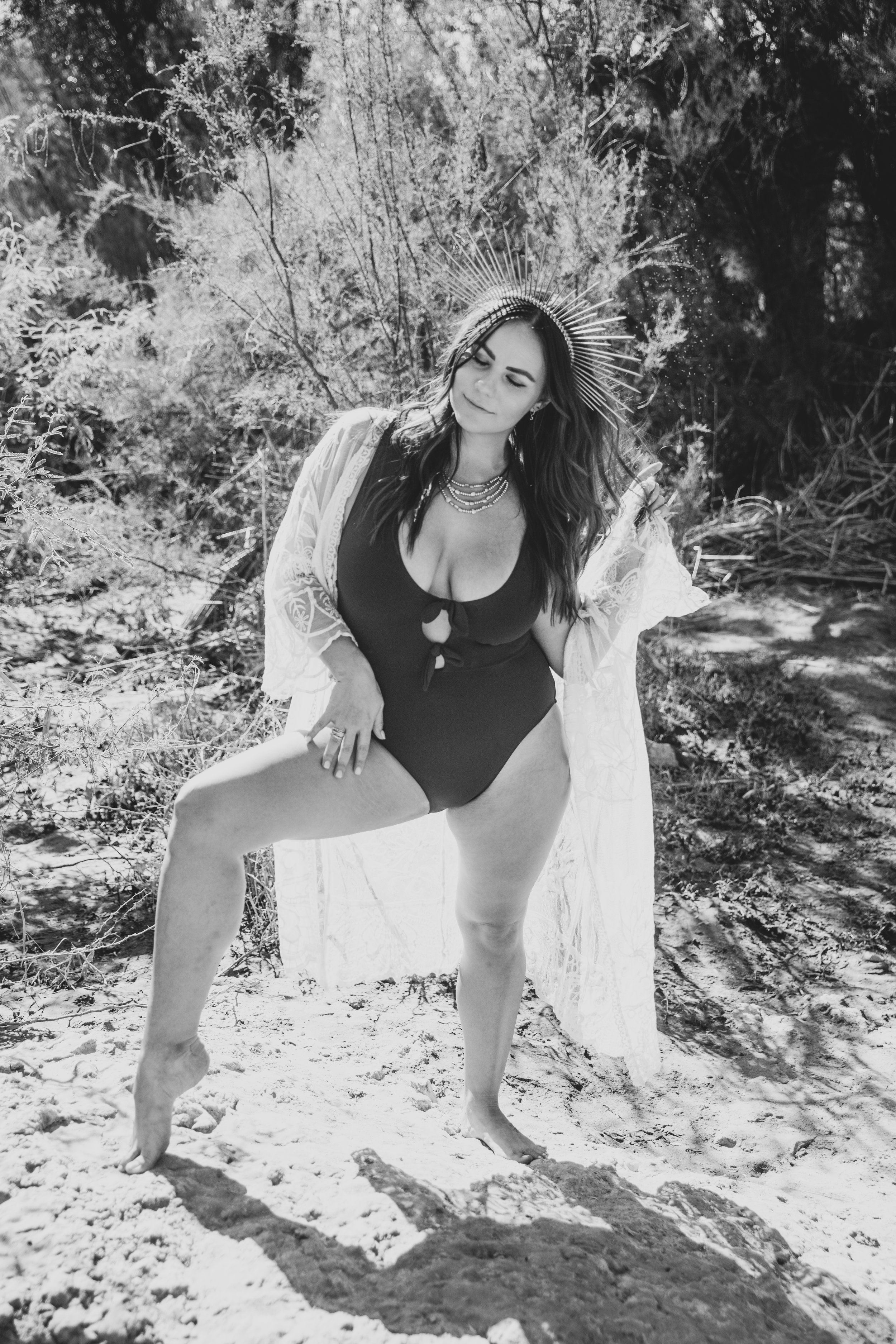 Woman poses for non-traditional boudoir photography at the Salt River, Arizona, by Phoenix Boudoir Photographer Jennifer Lind Schutsky.