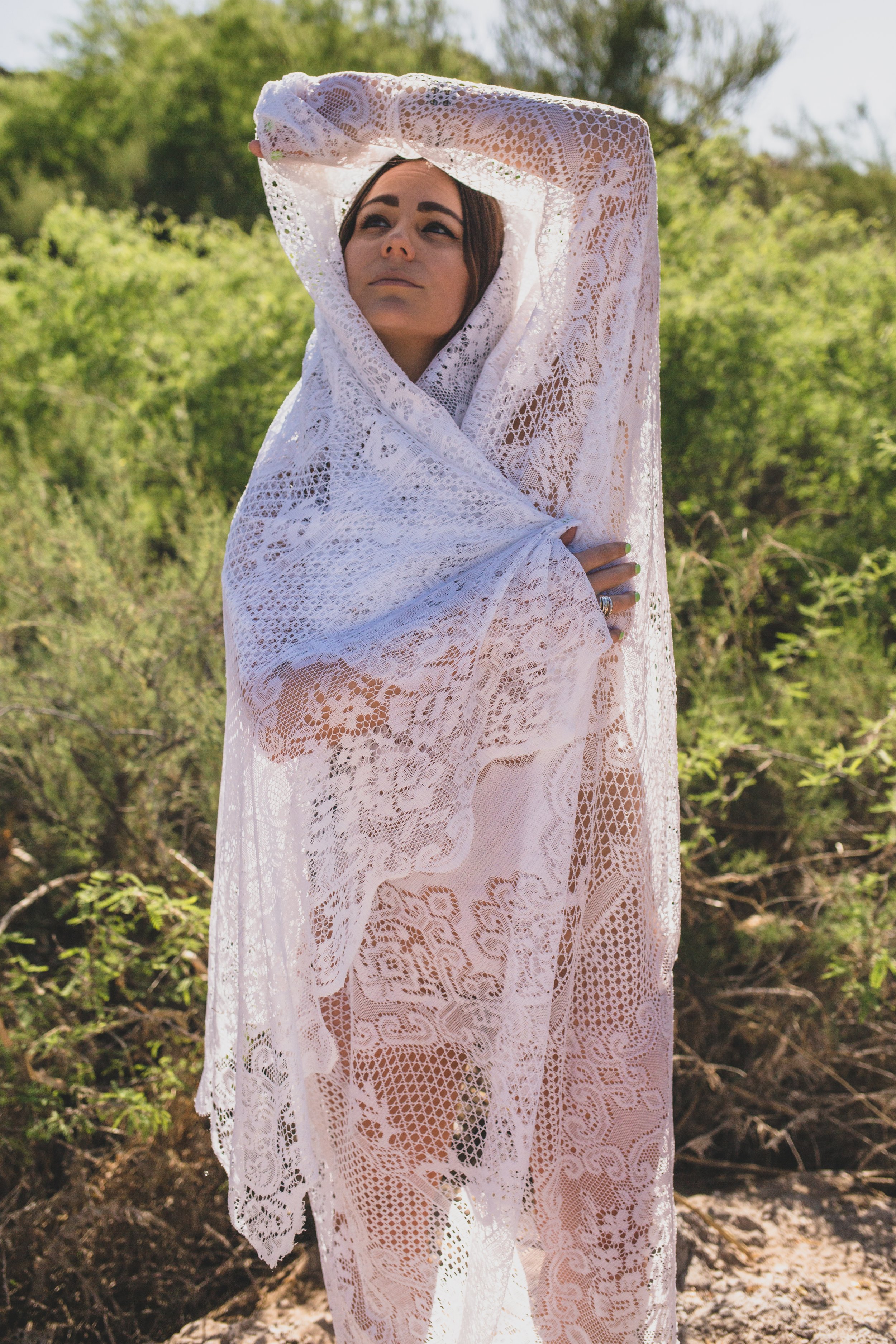 Woman poses for non-traditional boudoir photography at the Salt River, Arizona, by Phoenix Boudoir Photographer Jennifer Lind Schutsky.