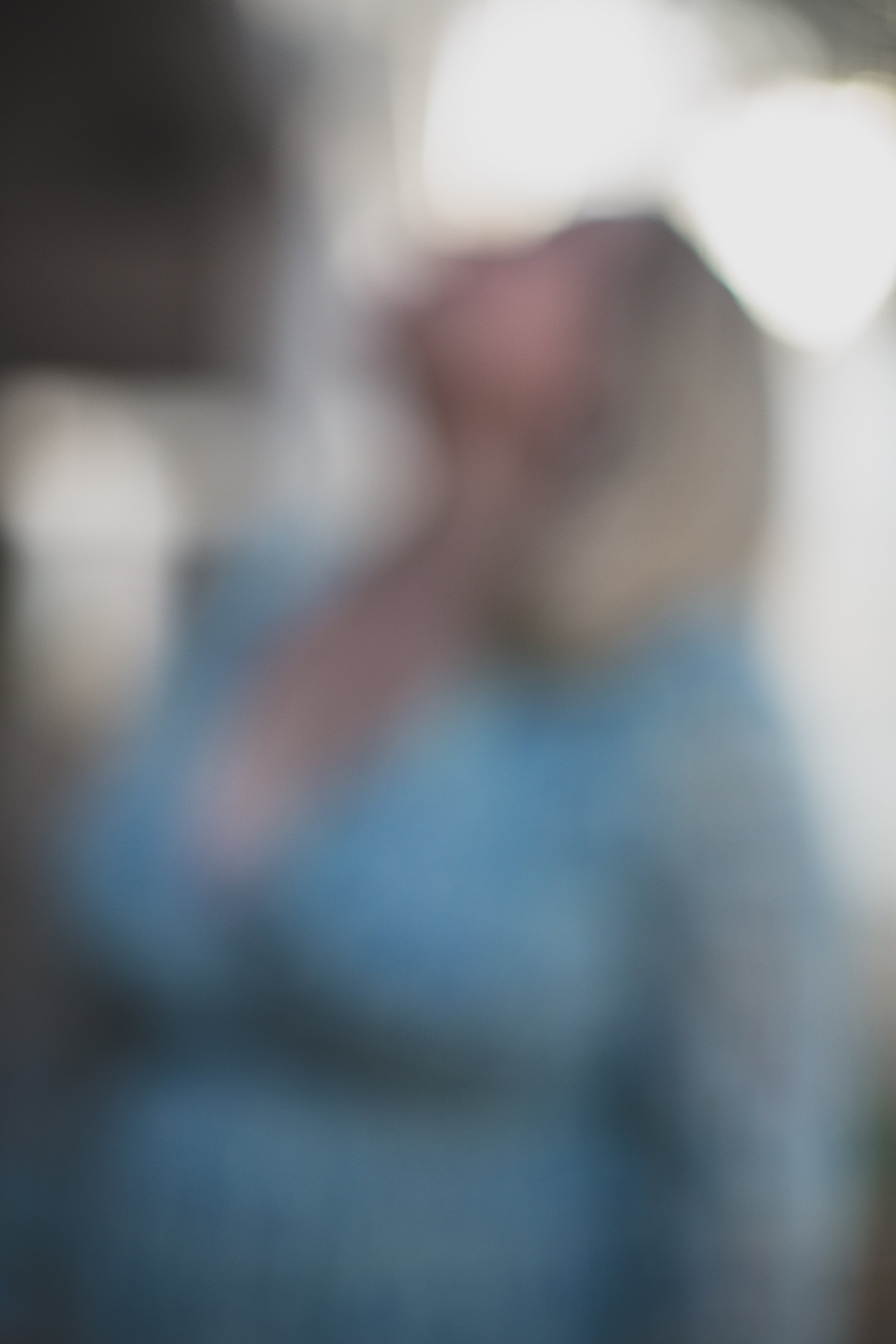 Blurry woman stands looking up  in mist at sunset for the #portraitproject by Creative Phoenix Photographer; Jennifer Lind Schutsky.