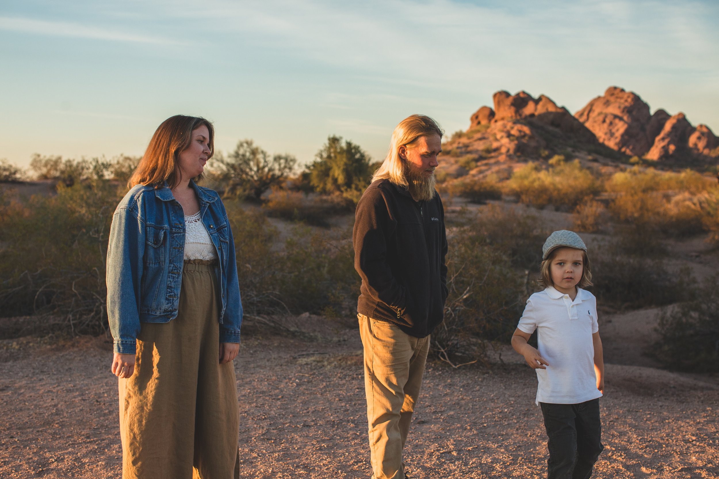 Stylish family poses during family desert photo session near Papago Park in Tempe, Arizona by Phoenix based family photographer Jennifer Lind Schutsky. 