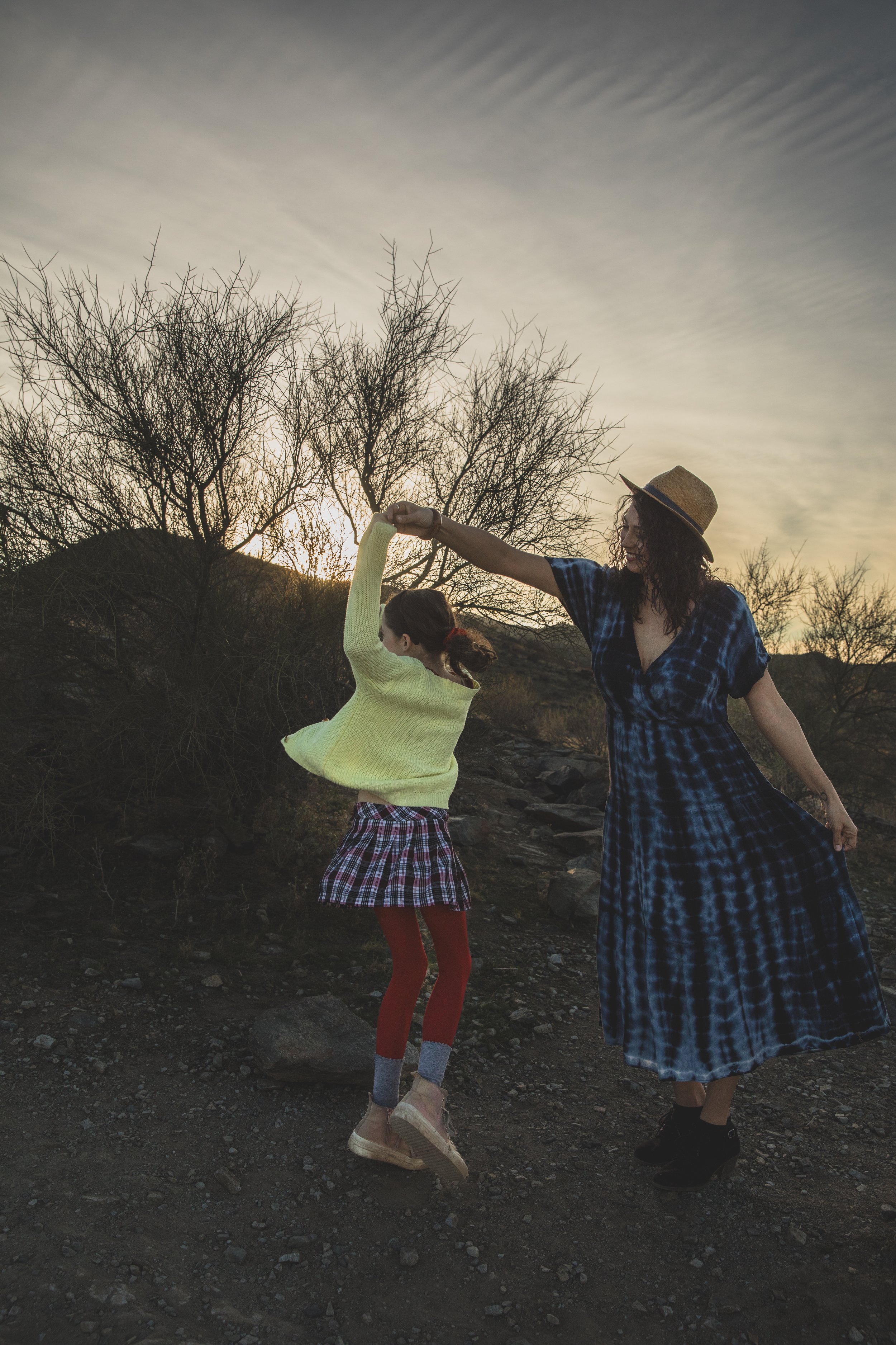 Woman and children pose during their lifestyle, desert family photography session with Phoenix photographer, Jennifer Lind Schutsky.