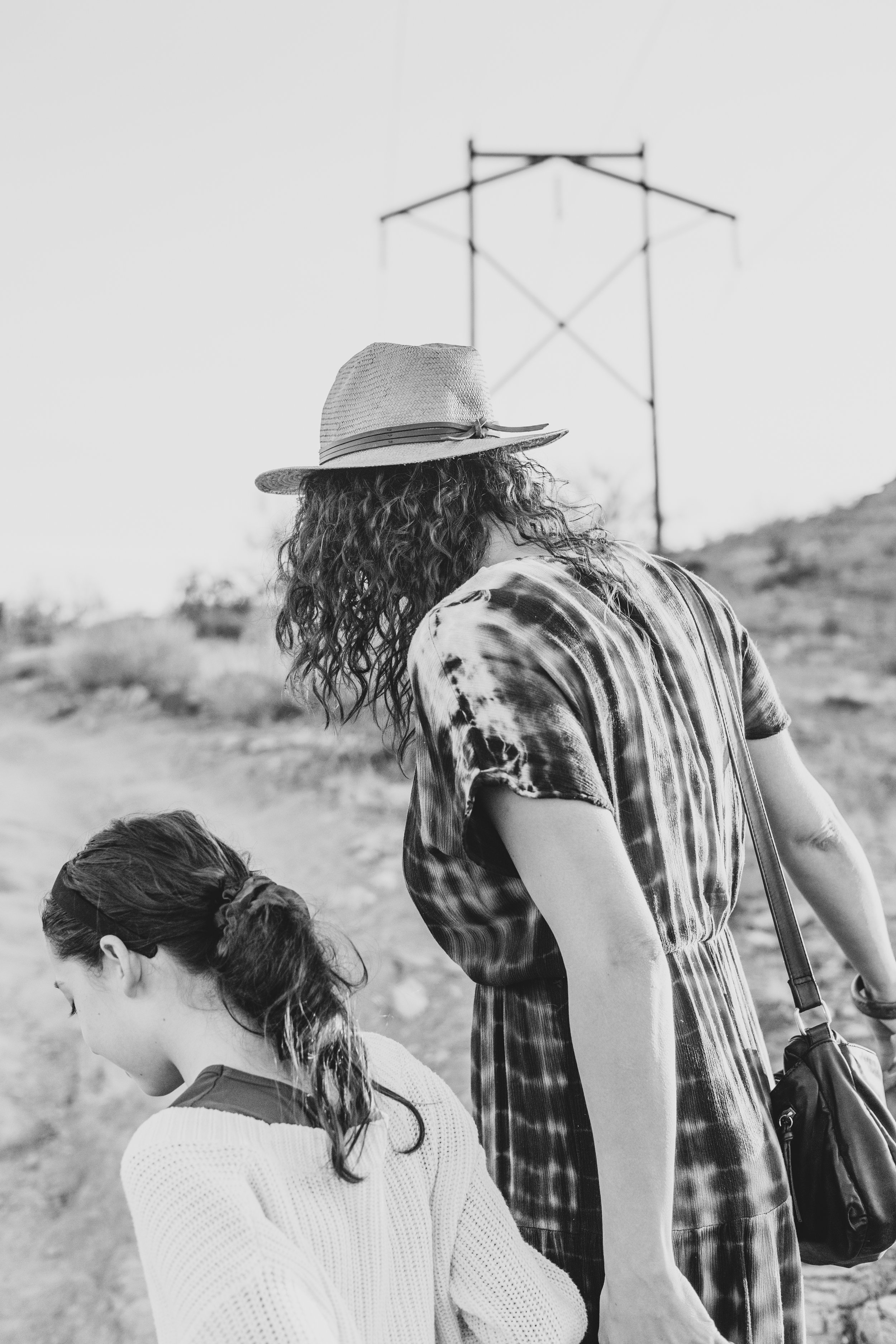 Woman and children pose during their lifestyle, desert family photography session with Phoenix photographer, Jennifer Lind Schutsky.