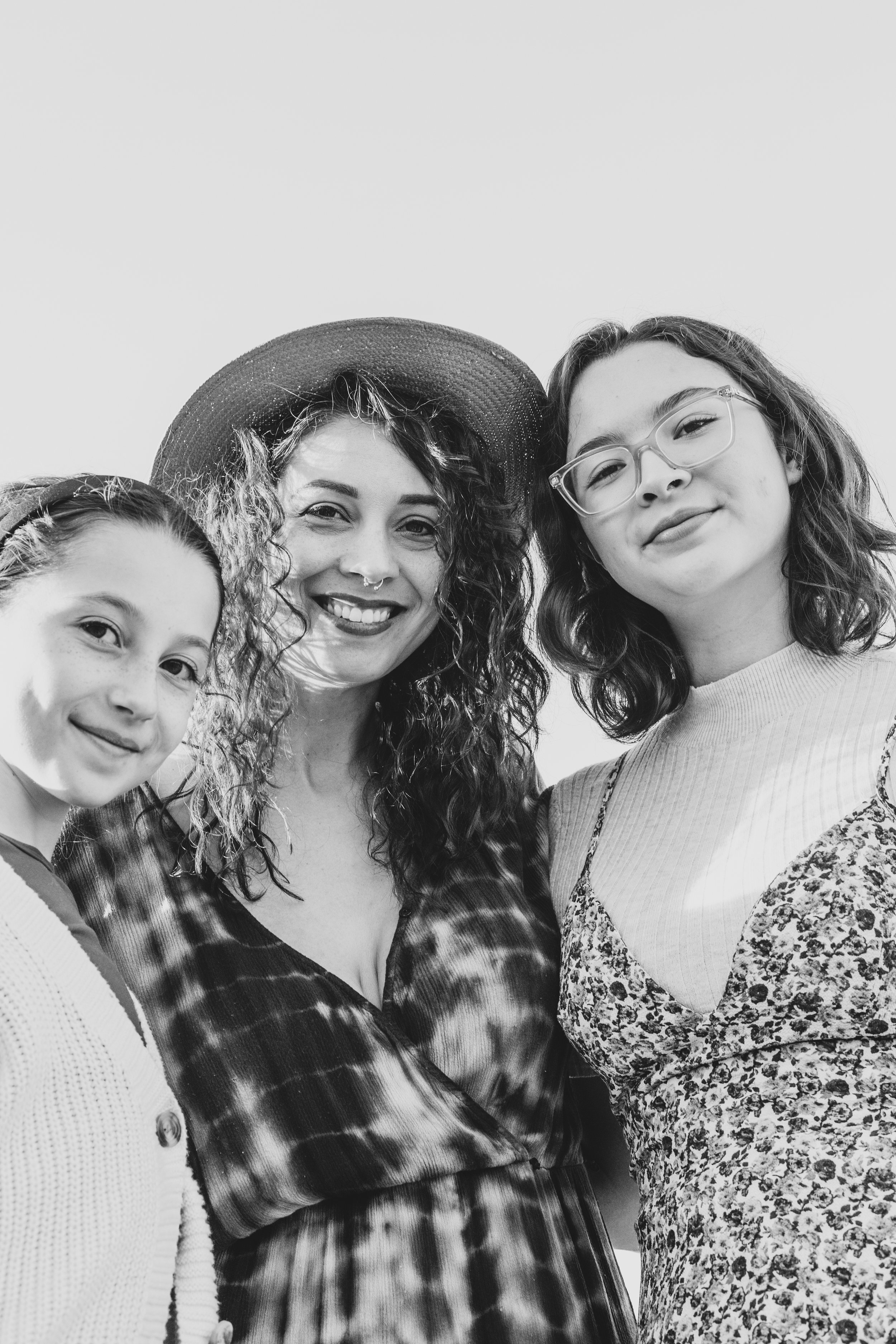 Woman and children pose during their lifestyle, desert family photography session with Phoenix photographer, Jennifer Lind Schutsky.