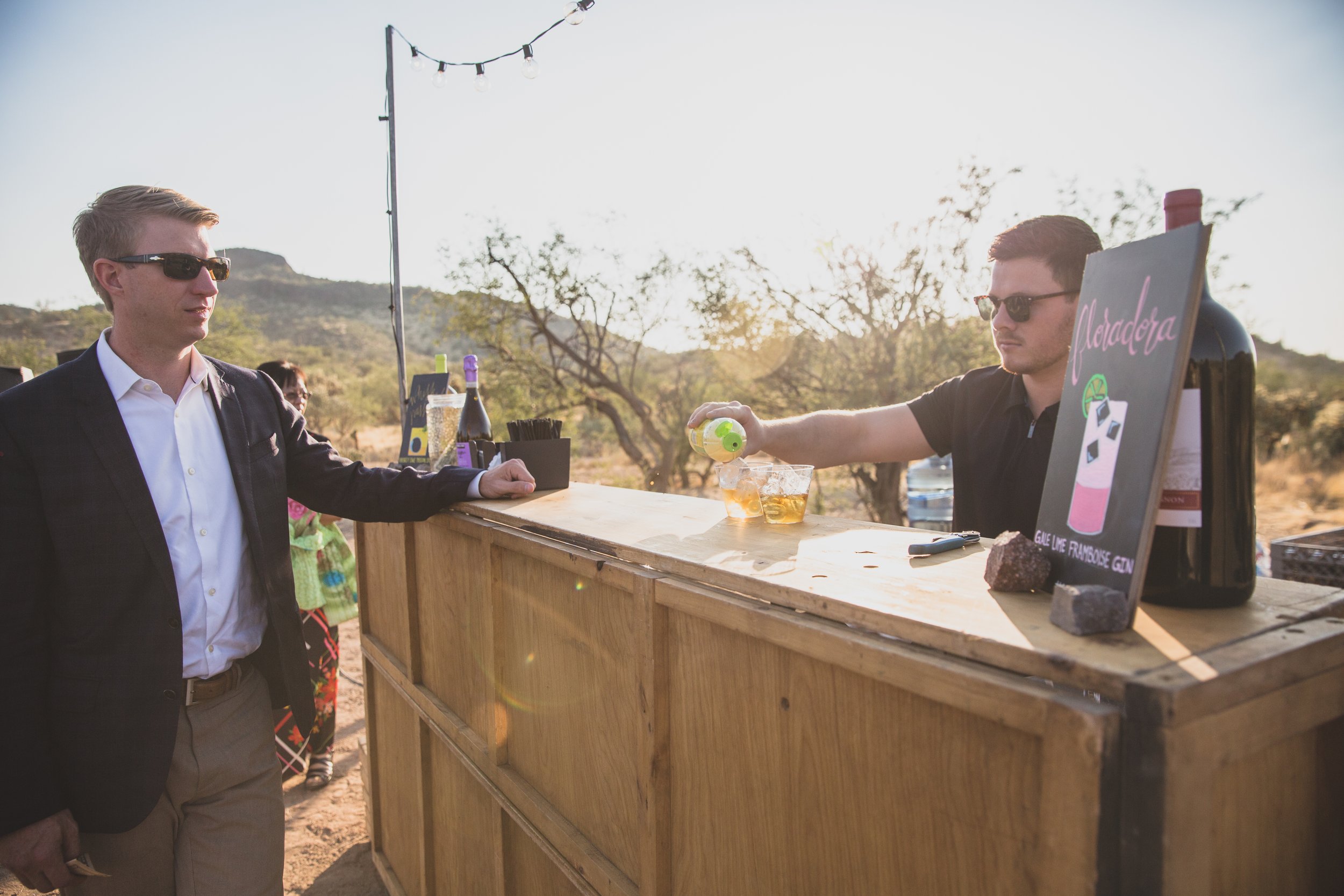 Pre-ceremony open bar at an intimate Superstition Mountain micro wedding by Cloth and Flame by Phoenix based wedding photographer, Jennifer Lind Schutsky. 