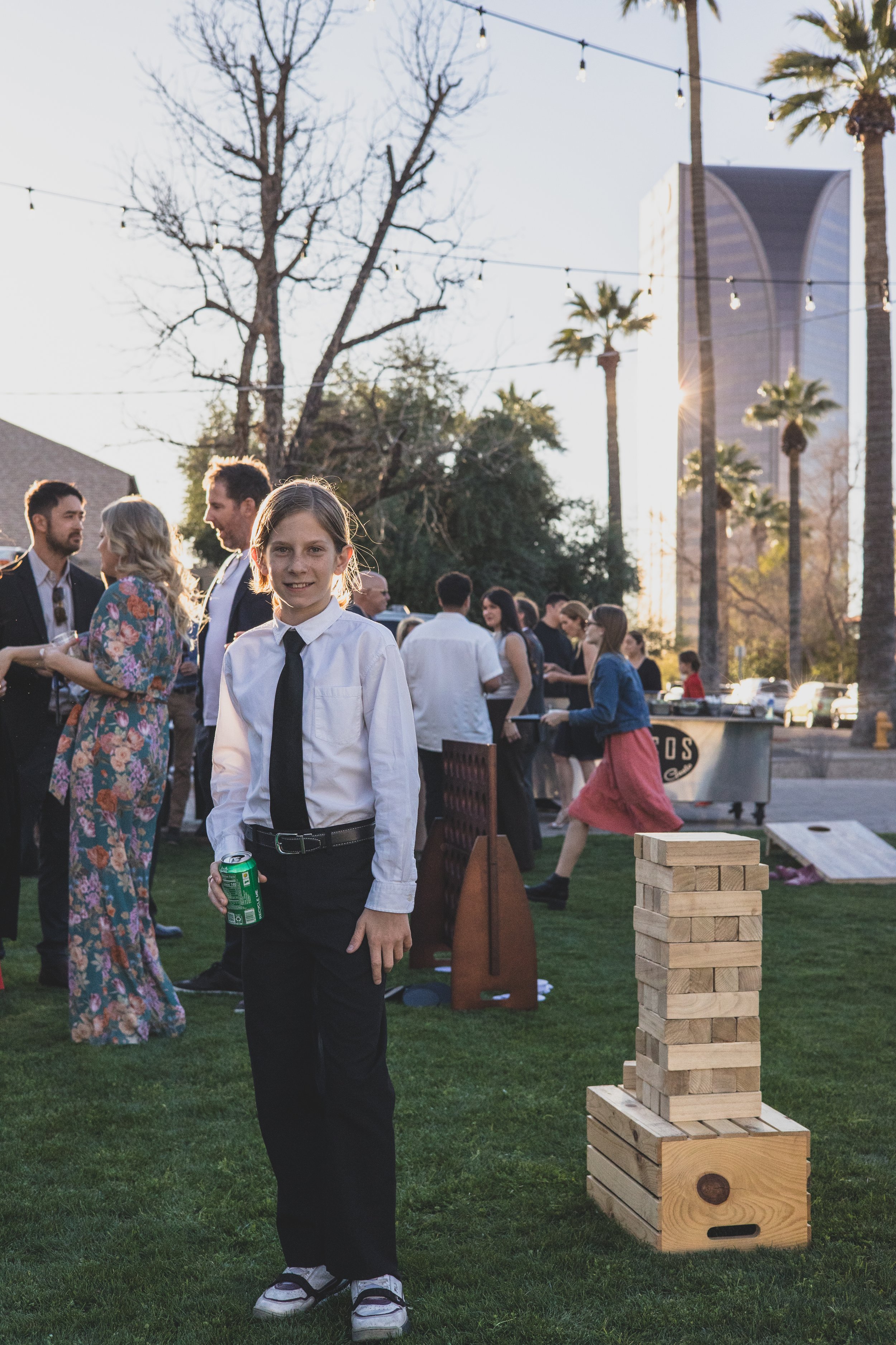 Guests at a Sunset Private Corporate on the lawn of Historic Downtown Phoenix's newest venue, the Coronado House by Corporate Event Photographer in Phoenix; Jennifer Lind Schutsky.