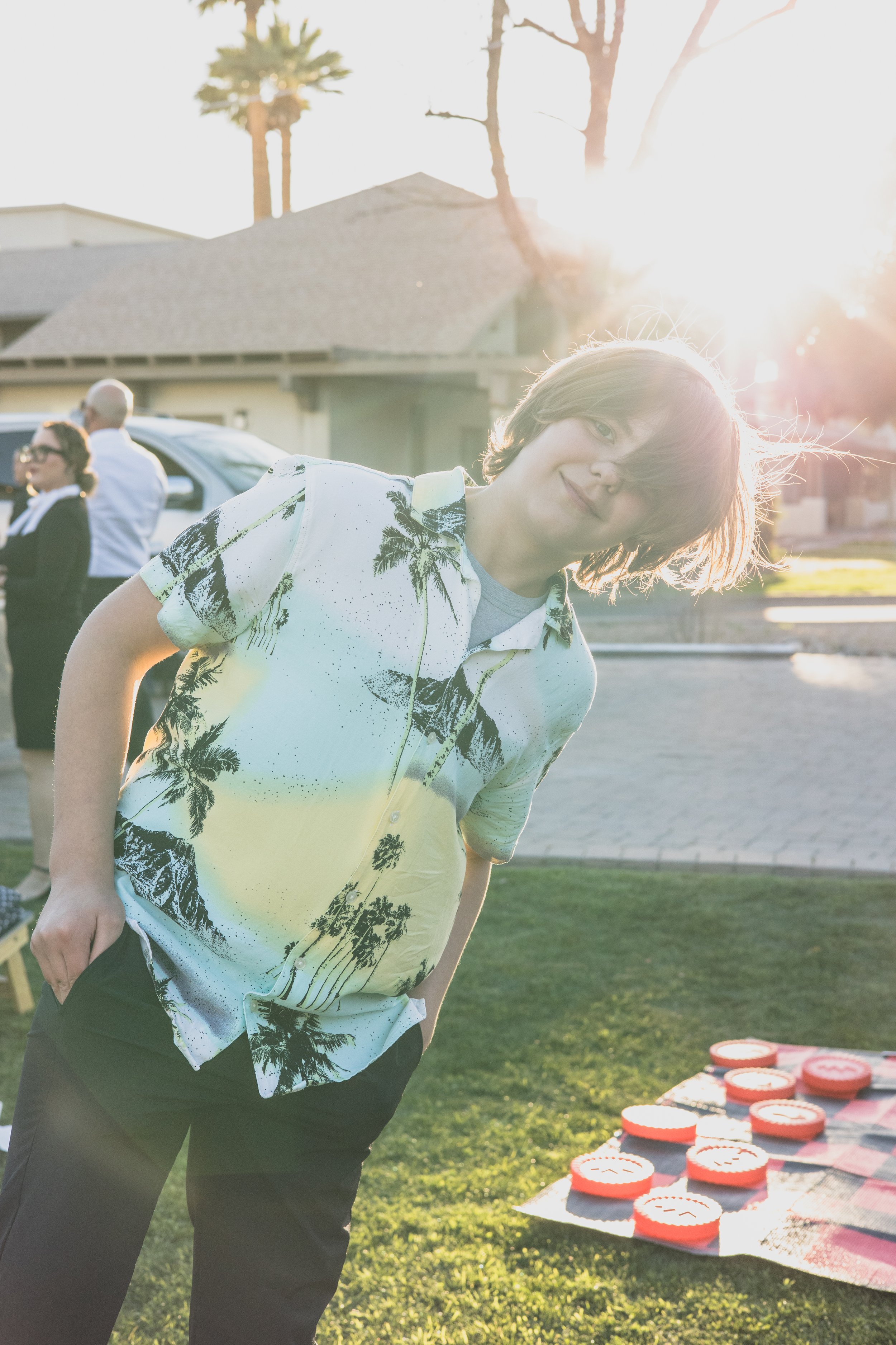 Guests having fun at a Private Corporate at sunset in the Coronado House a Historic Downtown Phoenix's newest venue, by Candid Corporate Event Photographer; Jennifer Lind Schutsky.