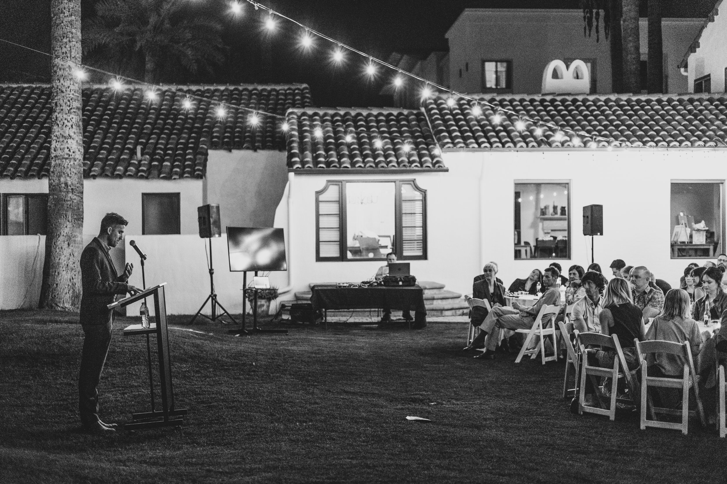 Guests at dinner during a Private Corporate event at the Coronado House a Historic Downtown Phoenix's newest venue, by Professional Corporate Event Photographer; Jennifer Lind Schutsky.