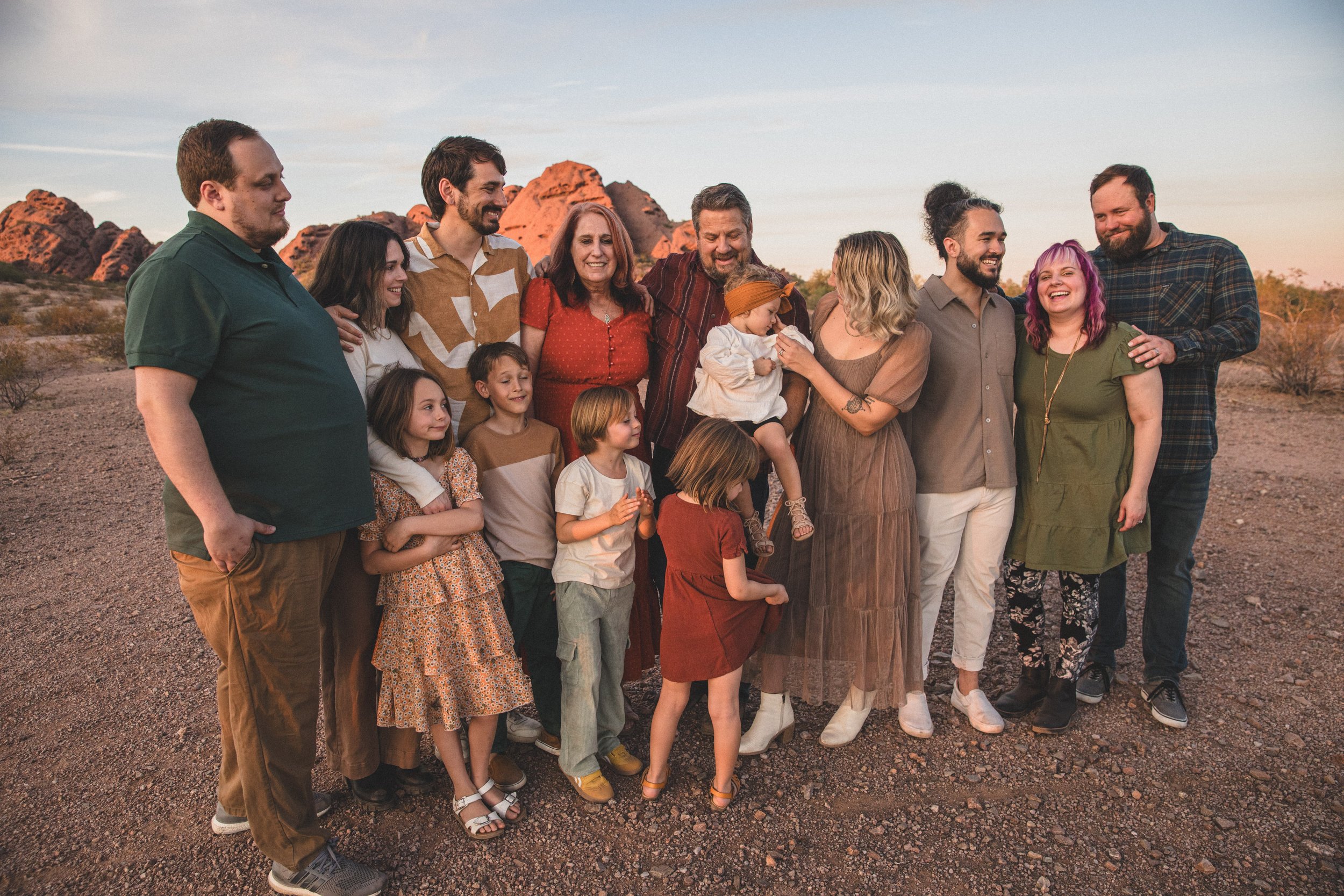Large family pose together at Papago Park Area in Tempe, Arizona by Jennifer Lind Schutsky