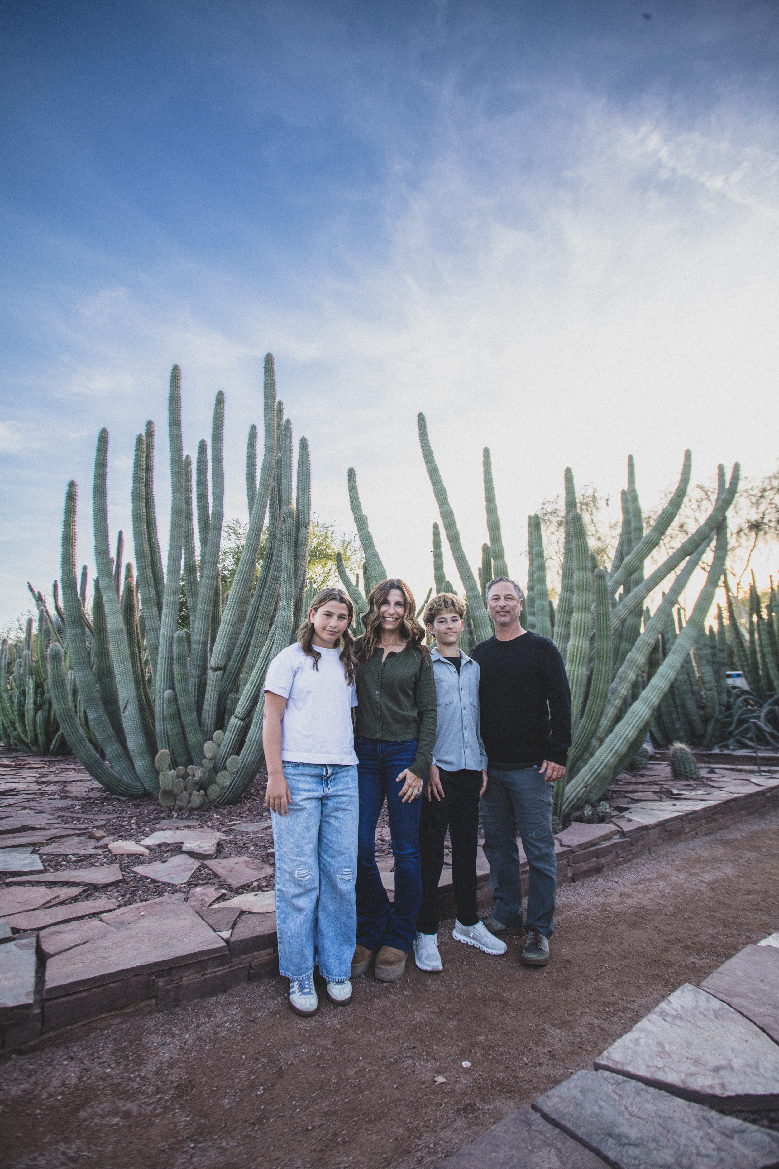 Family poses at the Desert Botanical Gardens in Tempe, Arizona by Photographer, Jennifer Lind Schutsky, January 2026