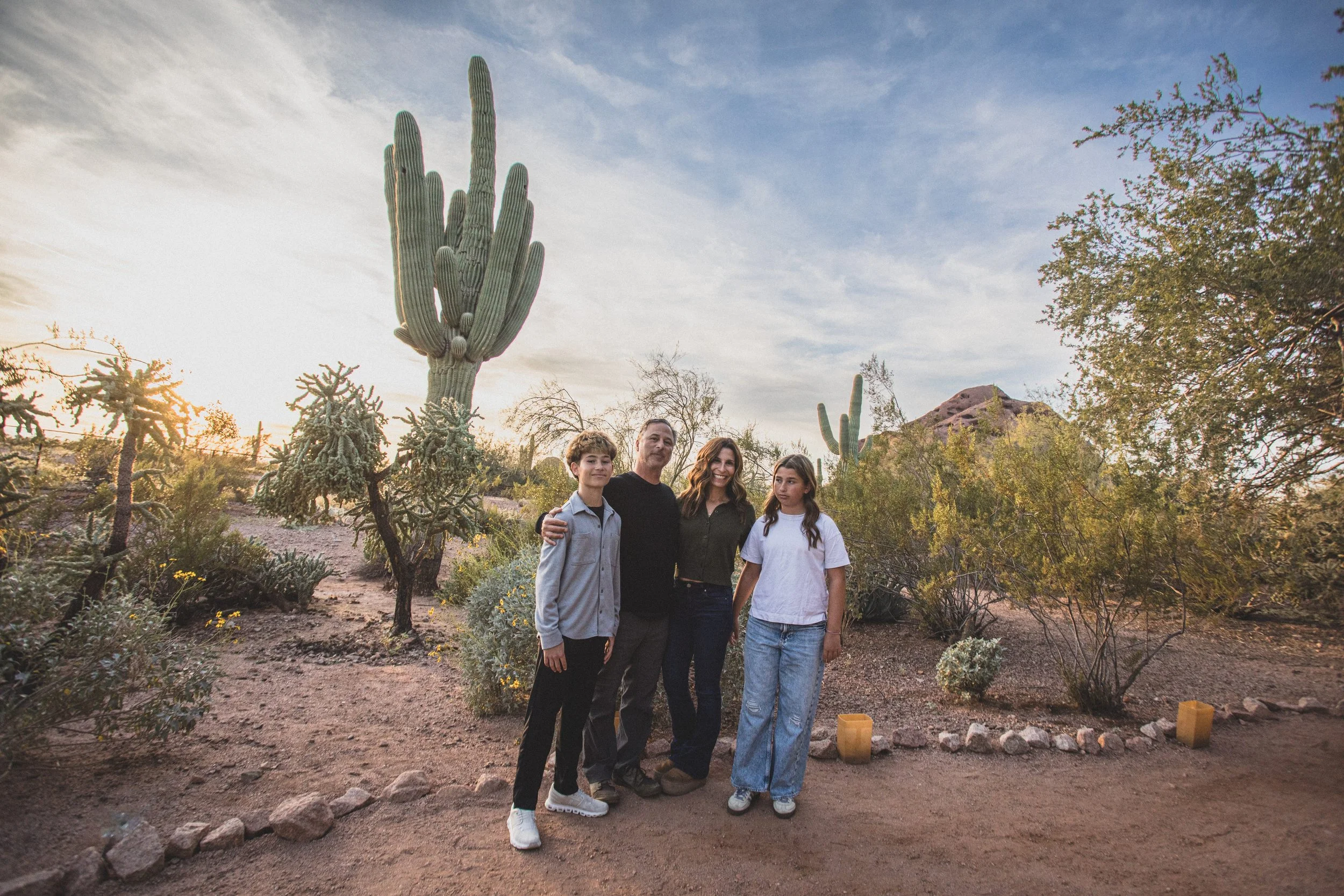 Family poses at the Desert Botanical Gardens in Tempe, Arizona by Photographer, Jennifer Lind Schutsky, January 2026