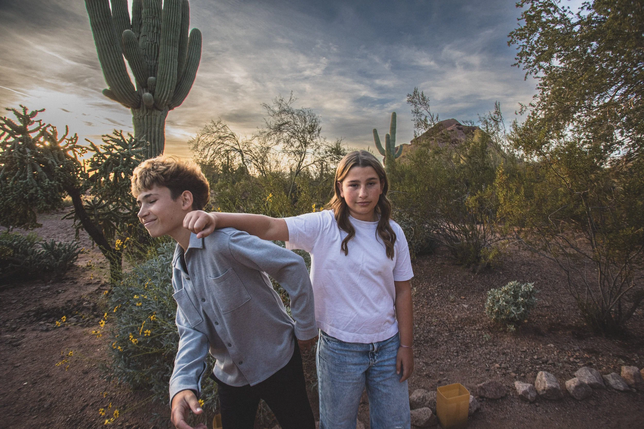 Family poses at the Desert Botanical Gardens in Tempe, Arizona by Photographer, Jennifer Lind Schutsky, January 2026