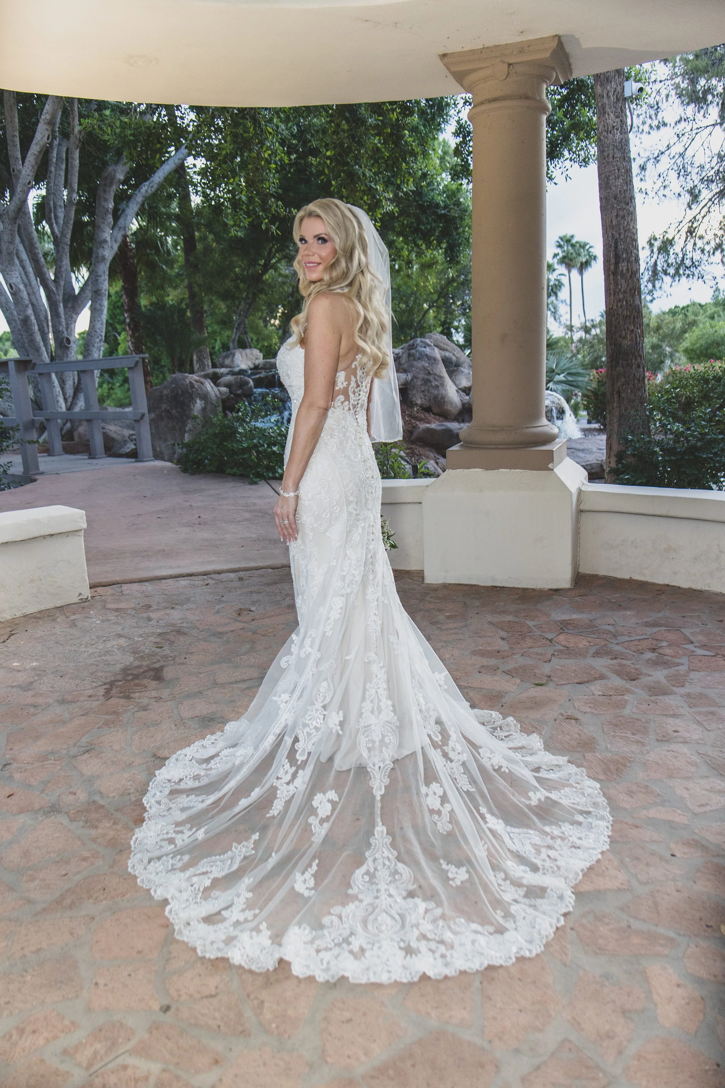 Bridal portraits at Val Vista Lakes Event Venue by experienced wedding photographer in Arizona, Jennifer Lind Schutsky.