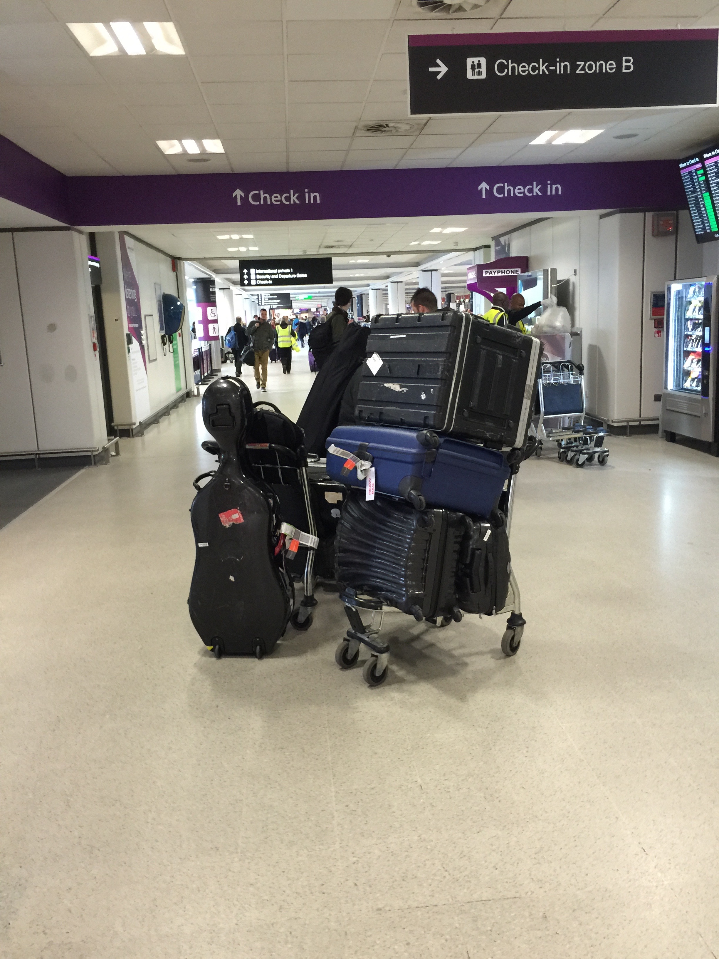Stringfever electric quartet london airport luggage.jpg