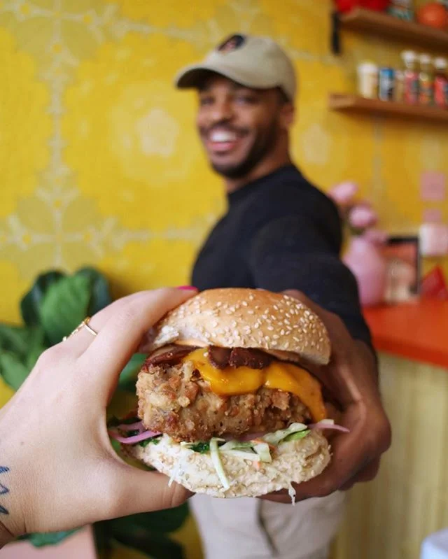 Picnic Basket handoff 🍔💛 TRUE #veganrelationshipgoals photo from @wholelottafoodshit and @veganbodegacat