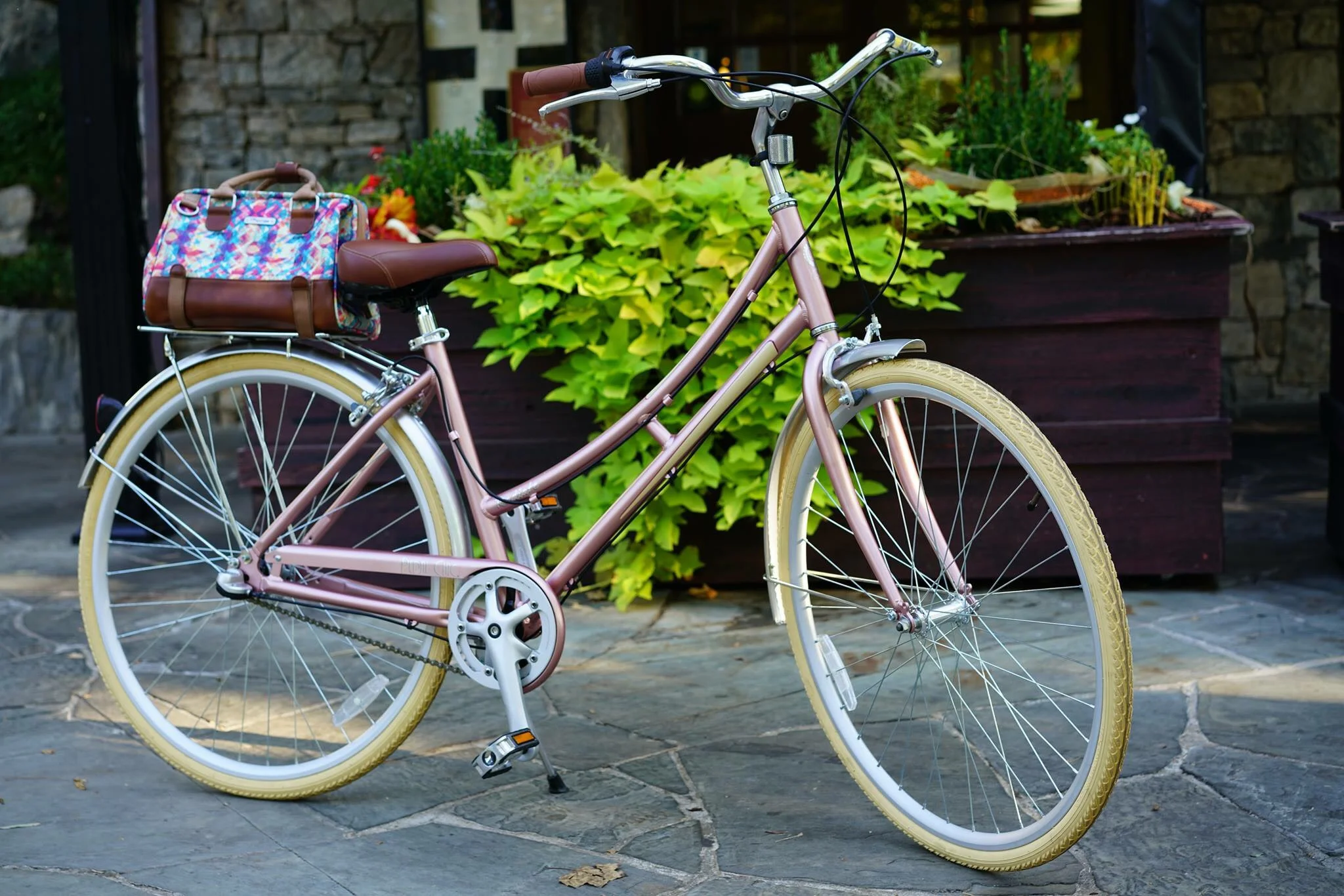 The Radiate ($357), with its matte dusty rose paint job, cream tires and leather accents, is the "must-have fashion bike" of the Pedal Chic line.