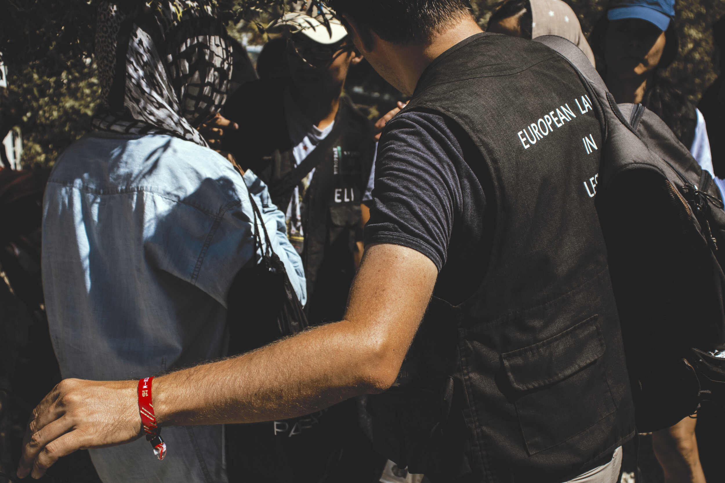 ELIL volunteer with refugee