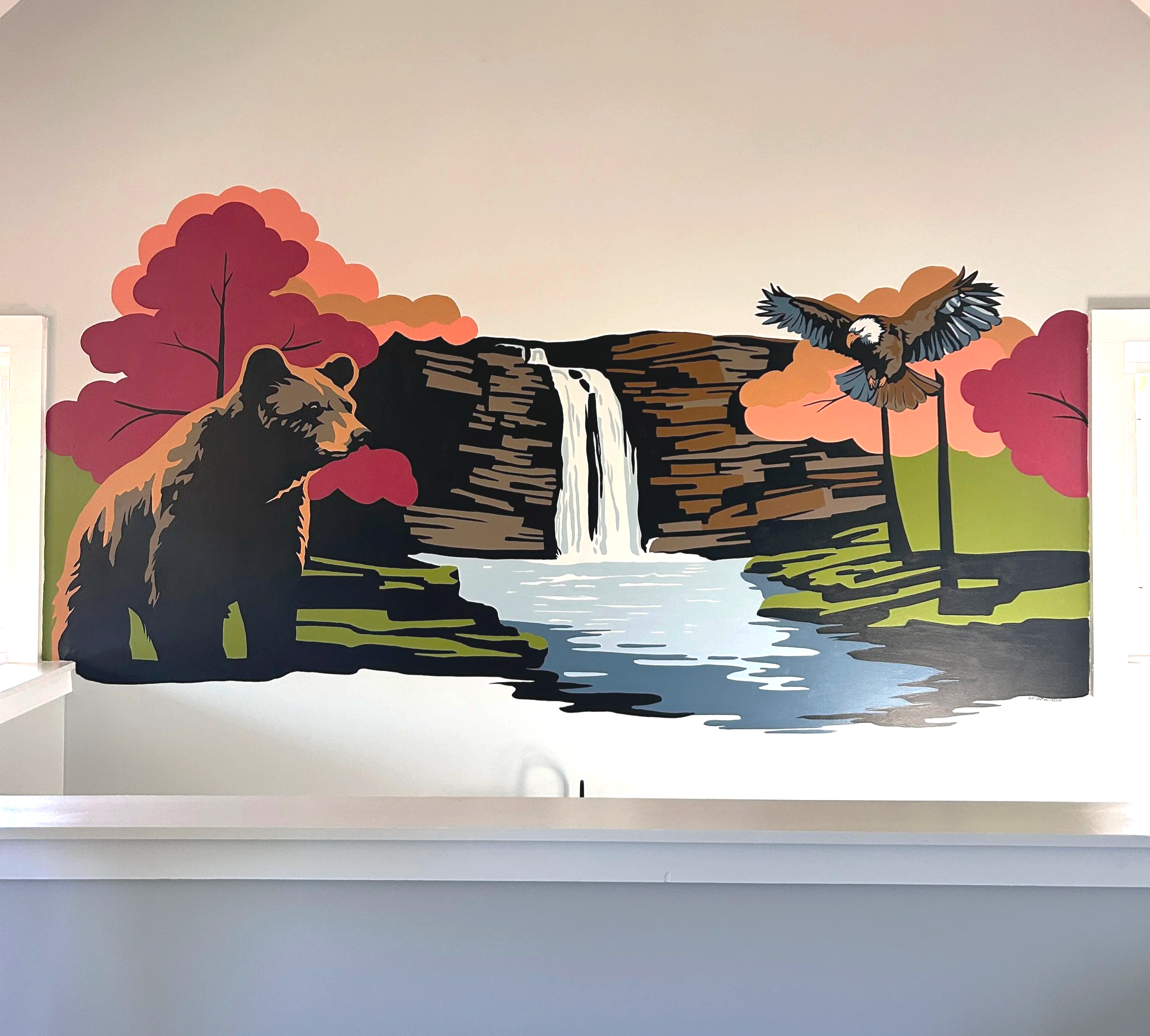 Colorful mural for Residential space. Wall mural painted in vibrant paint colors, black bear, eagle and Fall Creek Falls. Cookville Tennessee