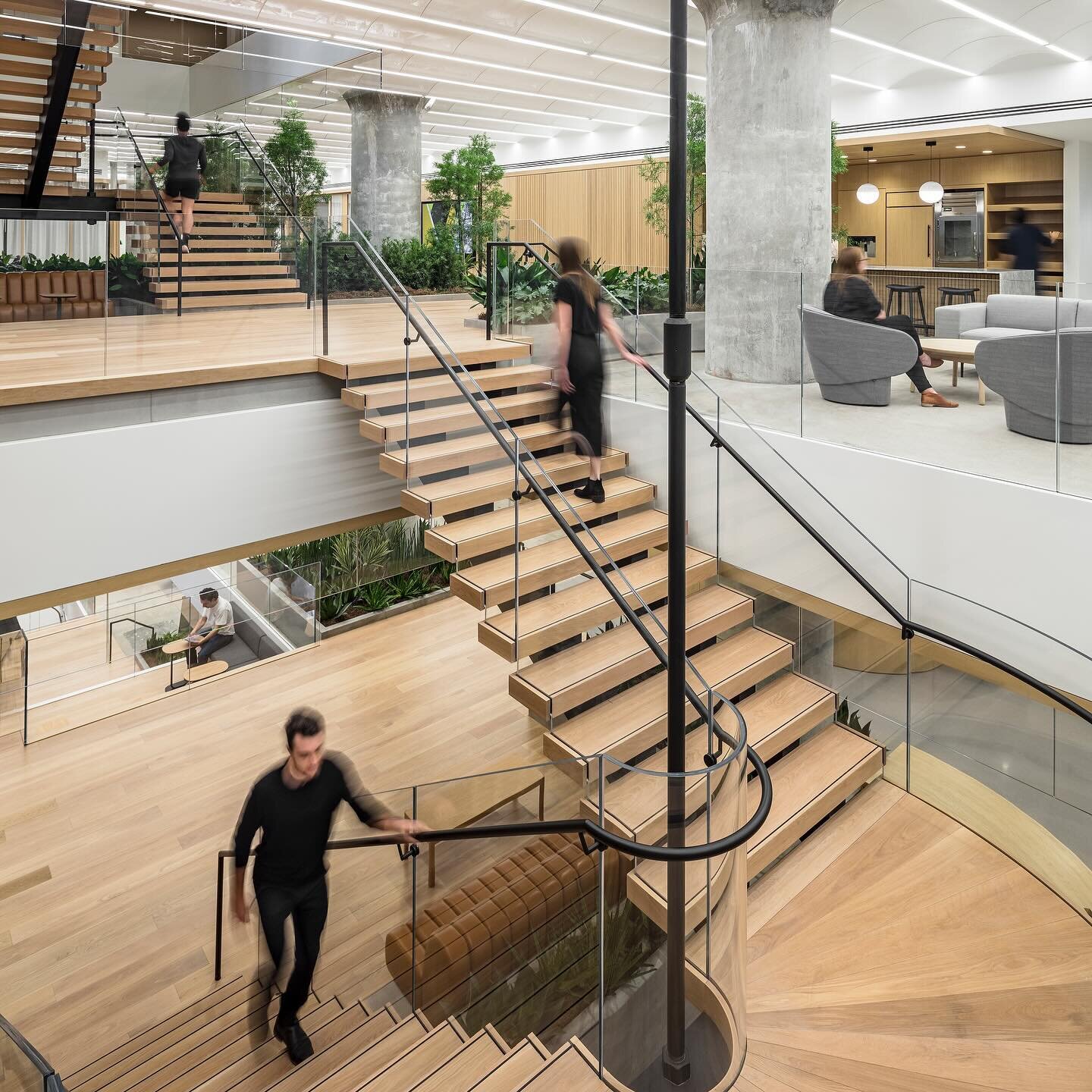 At Peloton&rsquo;s Headquarters, social spaces, once confined to the top floor, were intentionally extended across eight floors, providing equal support and access for everyone. The newly vertically linked spaces orbit around an open atrium and conti