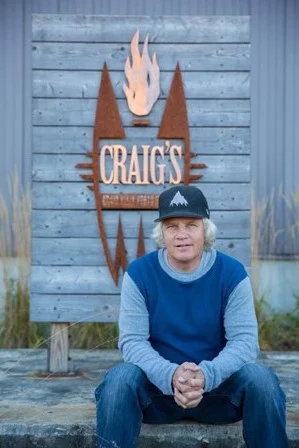 John Gerndt’s roots run as deep as any in the New England snowboard scene, but his branches reach farther than most. After thirty-plus years in Vermont, serving a key role on Burton’s hardgoods development team, JG’s experience, impact, and influence have earned him an affectionate nickname among his peers: “Yoda.” His passion and hard work have planted seeds of innovation that have changed the way people enjoy snowboards around the globe. His earliest claim to fame (which he’ll be the first to point out as arguable) is that he was the first Burton dealer in the state of New Hampshire, selling boards out of his living room while attending Plymouth State College. He was among the first generations of riders in the region, helping to define the culture and customs of this new approach to sliding on snow. In 1983 he landed a spot on the Burton team, competing and testing the latest tech. In 1987 he moved to Vermont and started working at Burton full time. Jake Burton Carpenter quickly took advantage of the value that JG brought to product development, sending him across the pond to help guide the first Burton factories in Europe, and then all over the world with the Burton Team as a tester and designer. He played a preeminent role in designing revolutionary surf-inspired boards like the Fish, Malolo, Nug, and Resonator. He’s built boards for legendary riders like Terje Haakonsen, Kelly Clark, Danny Davis, Red Gerard, Chloe Kim, along with fellow hall-of-famers Jake and Donna Carpenter, Jeff Brushie, and Ross Powers (to name a few). Today, JG lives in Stowe, Vermont with his wife Maddy and their son Zaine. He still plays a leading role in Burton’s product development, rides an average of 100 boards a year, and does all he can to keep the fire burning for the younger generations. Look for him weaving through the trees on Mt. Mansfield or skating the bowl behind Burton HQ every day around lunchtime.