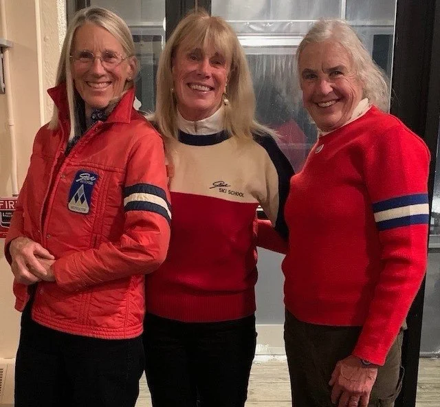 Carrie, Caroline and Carol model vintage Stowe Ski School uniforms from the Vermont Ski and Snowboard Museum collection during a celebration during the Stowe Ski School&rsquo;s 90th Anniversary party on December 10th, the same day in 1936 that Austri