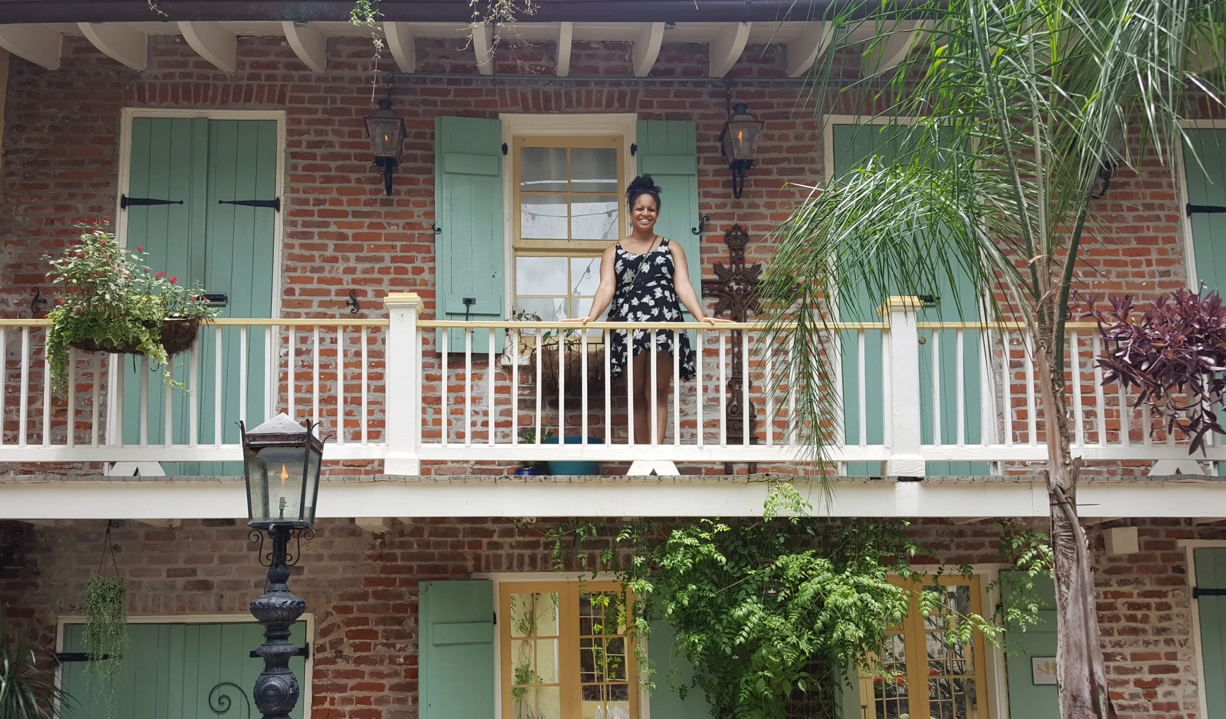 Enjoying a sunny New Orleans day in a gorgeous French Quarter courtyard.