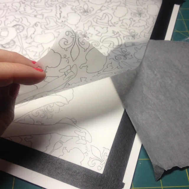 i place that tracing paper over my illustration board and use transfer paper to retrace the background pattern onto the board.