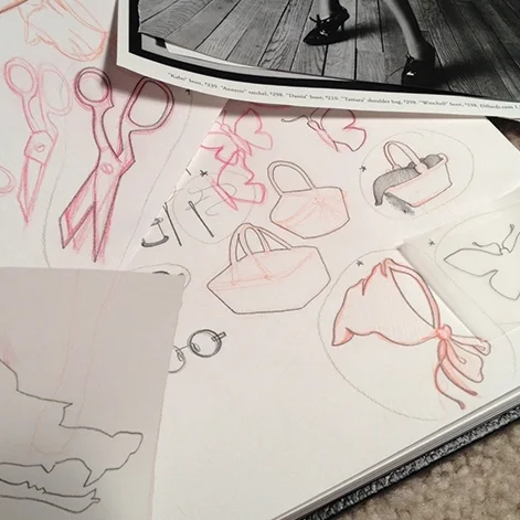lots of research into various versions of the tale– and then deciding on the most important shapes (story icons) & facets to the tale. i've also been known to tear through pages of VOGUE to find power stances or other posture inspiration to help identify our characters.