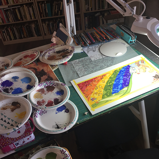 here’s a view of SOME of the paper plates i mixed our paints on… i keep them from each painting because i can reuse the puddles for other smaller areas, particularly on the figures which i don’t paint opaquely.