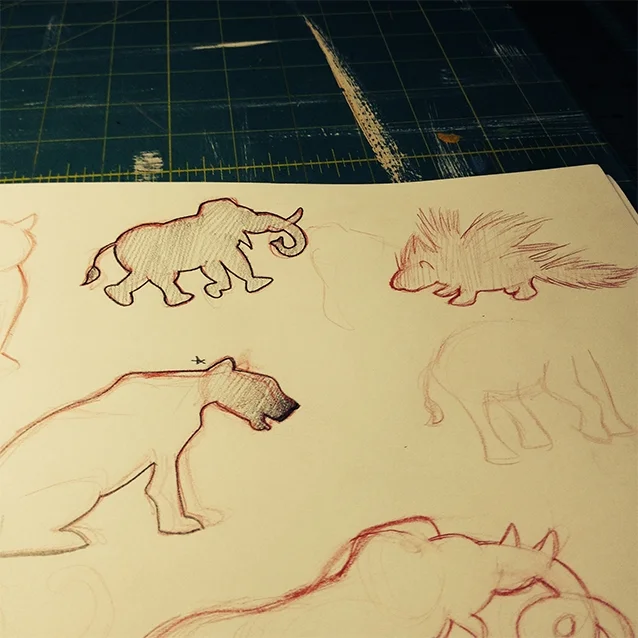 after reading all of kipling’s mowgli stories and “the jungle book” and taking copious notes, i get to start sketching icons to use for the background pattern. here you’re seeing my experimental sketches for sahi the porcupine, bagheera, and hathi the wild elephant.
