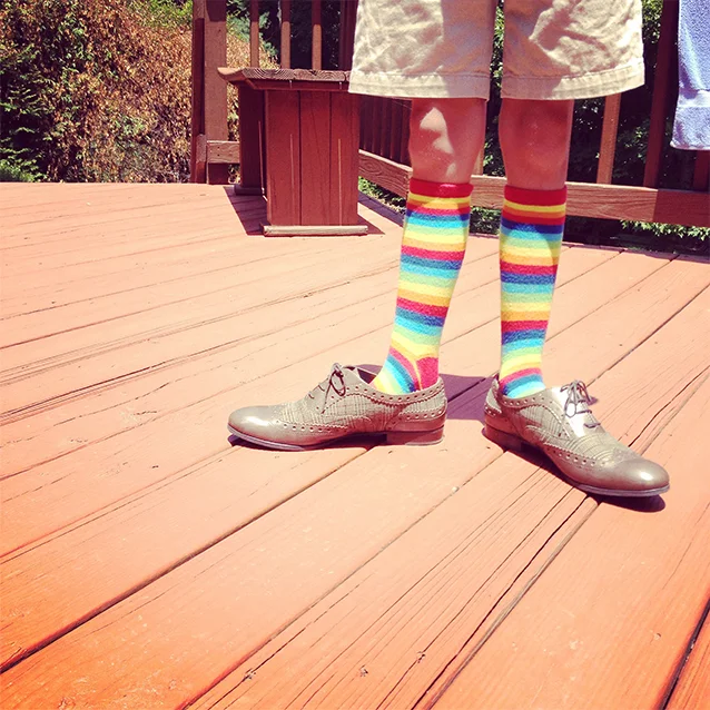 my niece kathryn, modeling for pippi in my socks and shoes for that dramatic wrong-size feel. i bought her ice cream {with sour gummi worms} later.