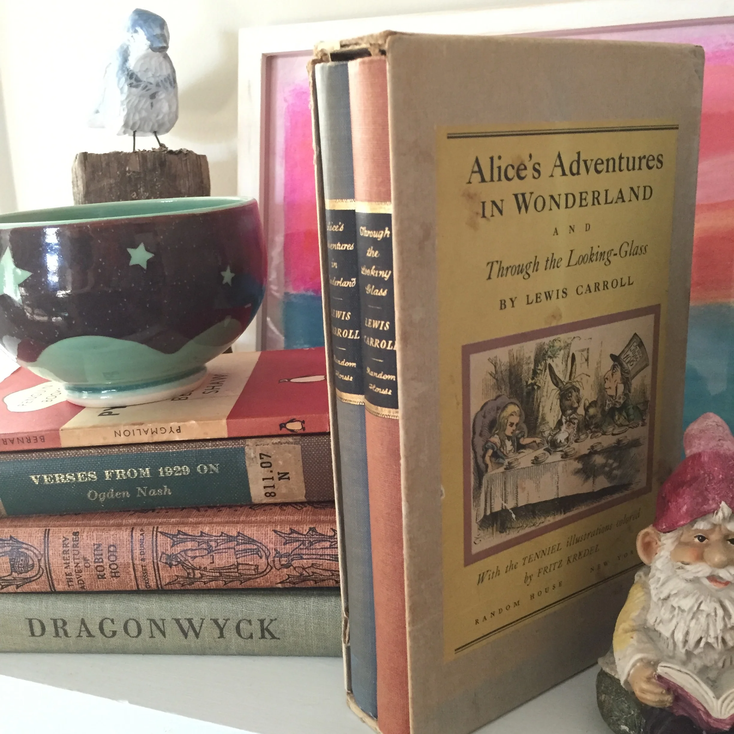 this box set of alice was the START of my antique/unique book collection habits. dad would always drag me to antique stores in watervliet, michigan to shop for tin soldiers, and lo and behold i fell in LOVE with beautiful OLD books. the adventures obviously continue…