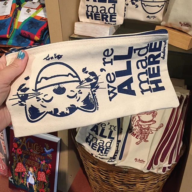 & here’s the final cheshire zipper pouch! i bought one for myself. also one of the hatter! ;D just $5 each in the upcountry history museum gift shoppe! perfect for art supplies, makeup, road trip essentials, and you know i’ll use it as a purse, too!! ;D