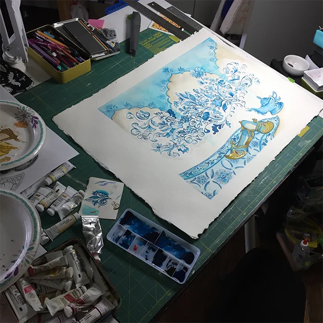 you can see the shiny in this lighting. ;) as well as my paper plates i use for mixing gouache so i can re-use it in future paintings. :)