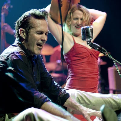 Steve Lucky &amp; the Rhumba Bums, ft. Miss Carmen Getit