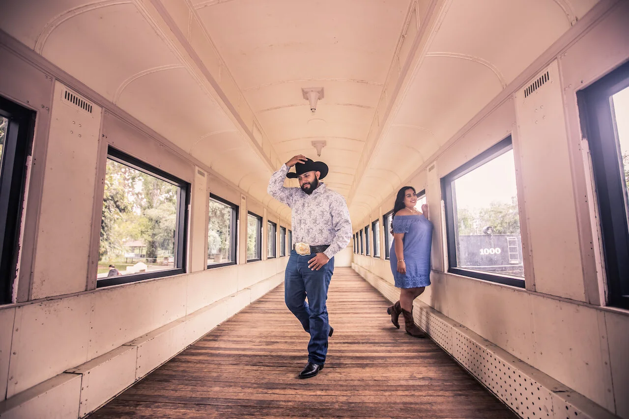 Couple alone in an empty rail carriage during a relaxed Los Angeles session