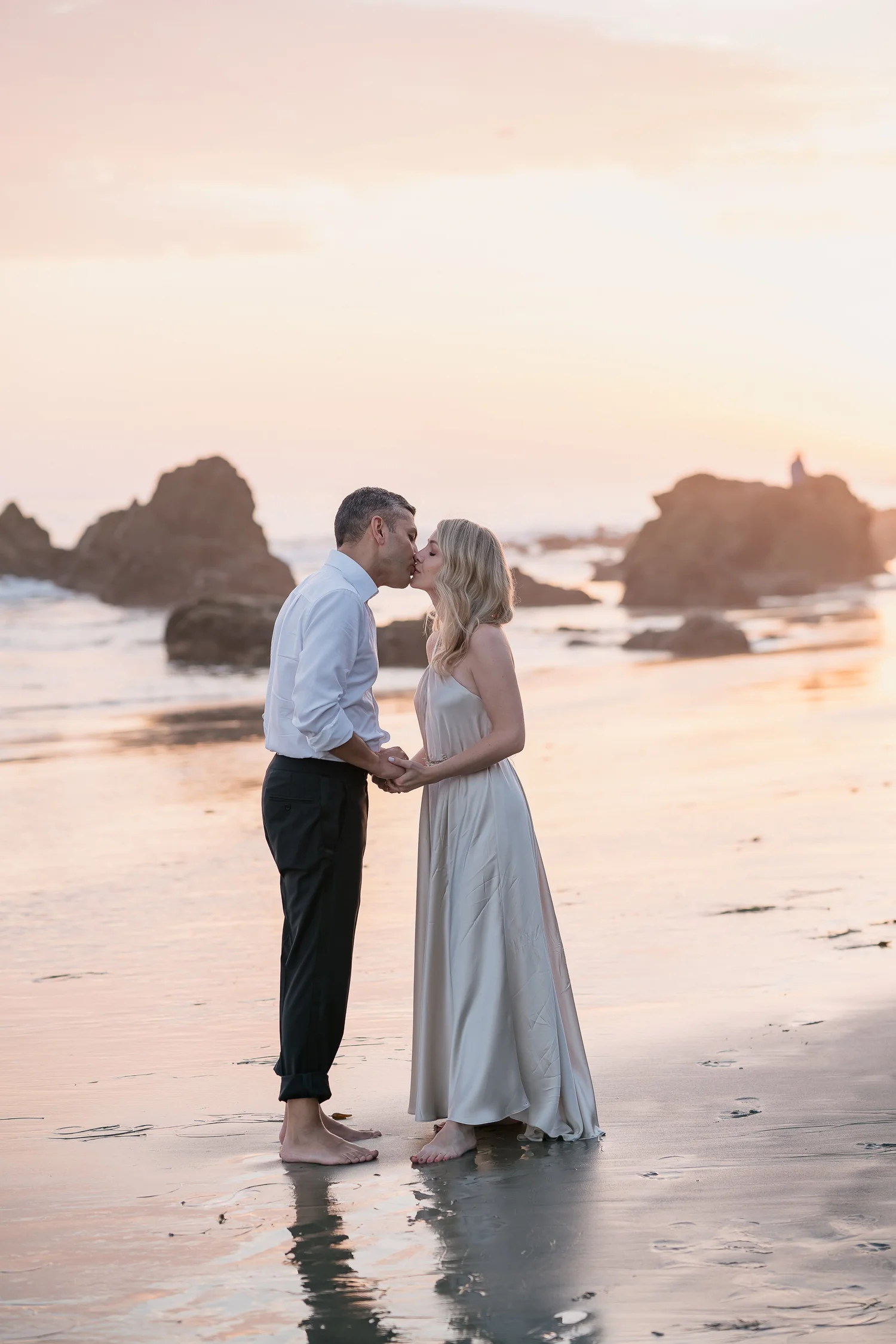Bride and groom eloping at El Matador State Beach in Malibu at golden hour — Lulan Studio