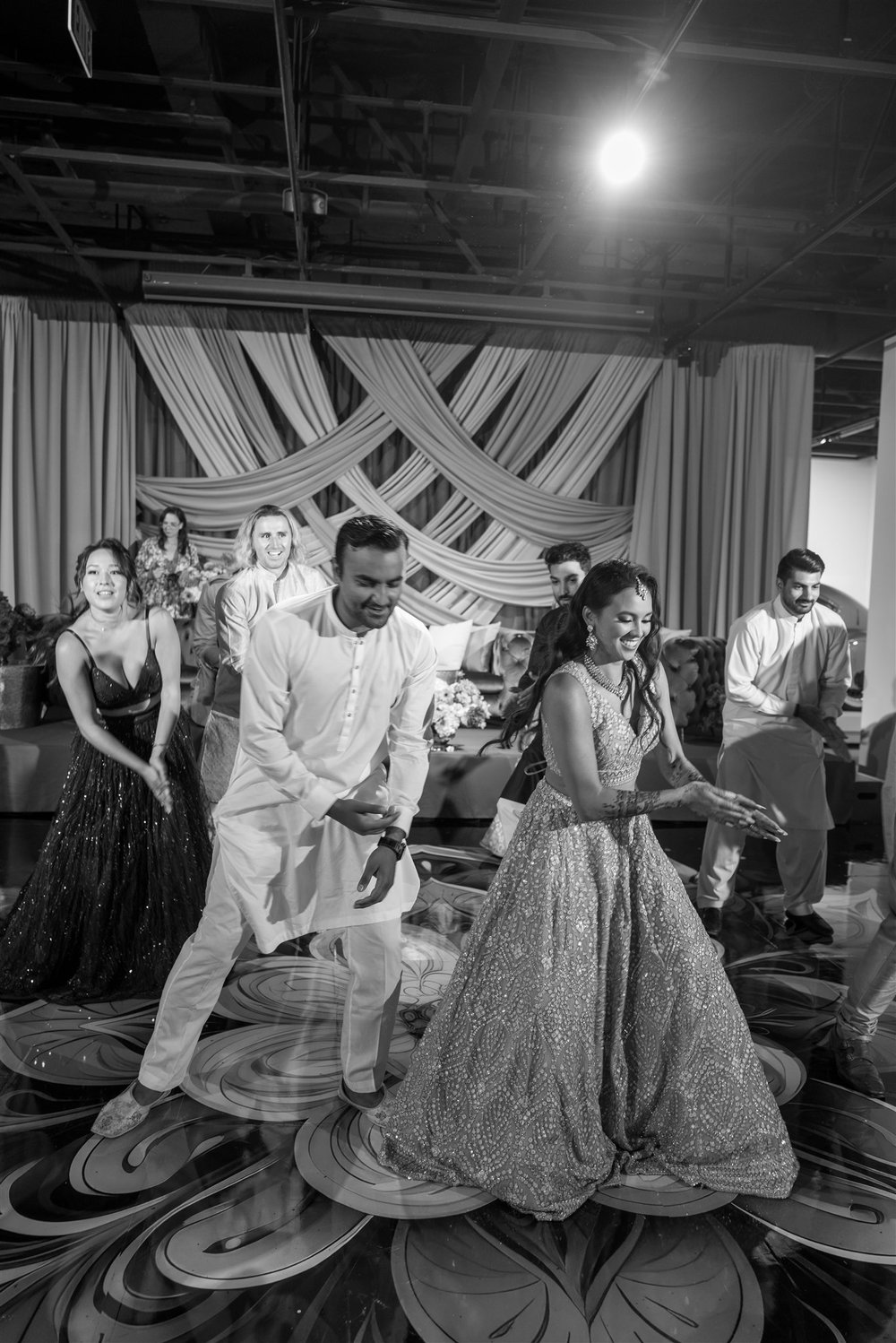 Black and White Photo of Bride and Groom Dancing