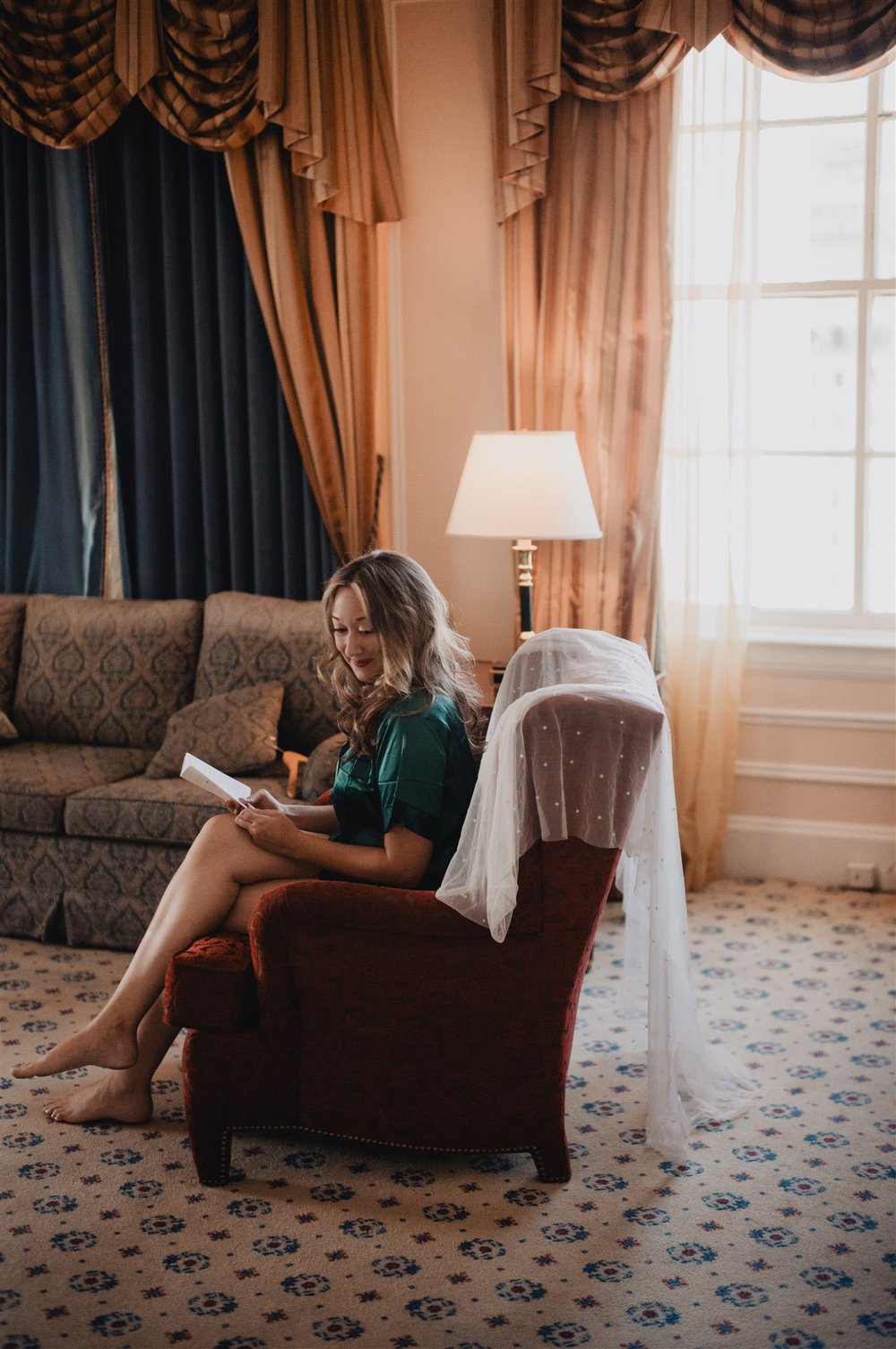 Bride Getting Ready at the Oviatt Penthouse, wedding photo by Lulan Studio