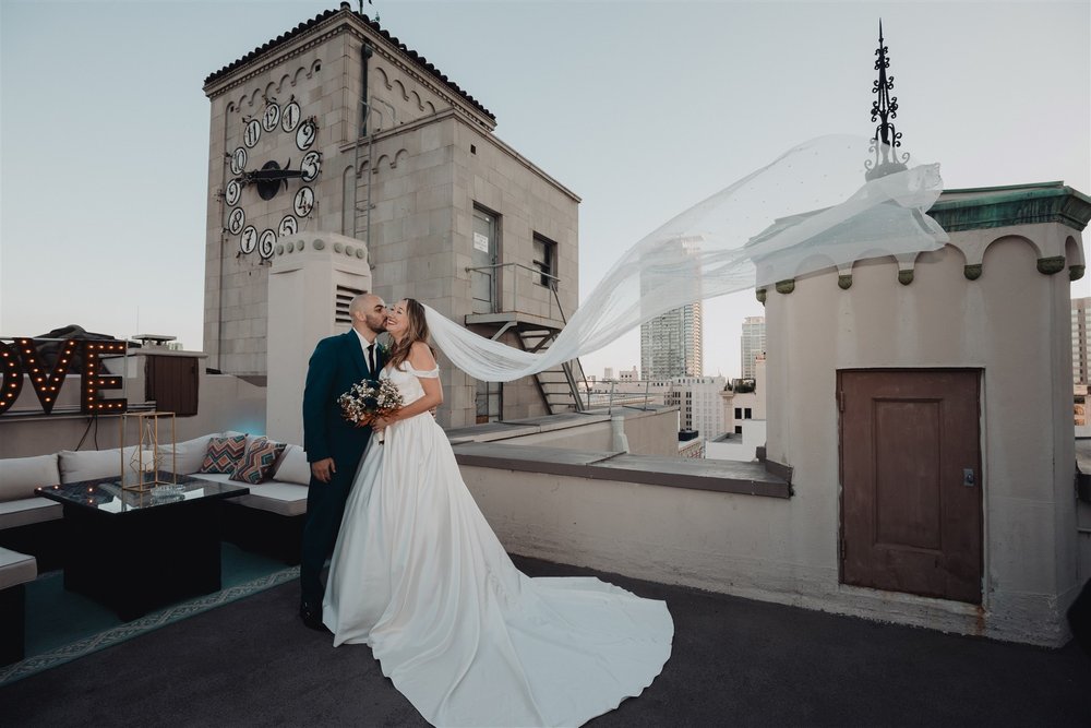 Bride and Groom Wedding Portrait at the Oviatt Penthouse, taken by Lulan Studio