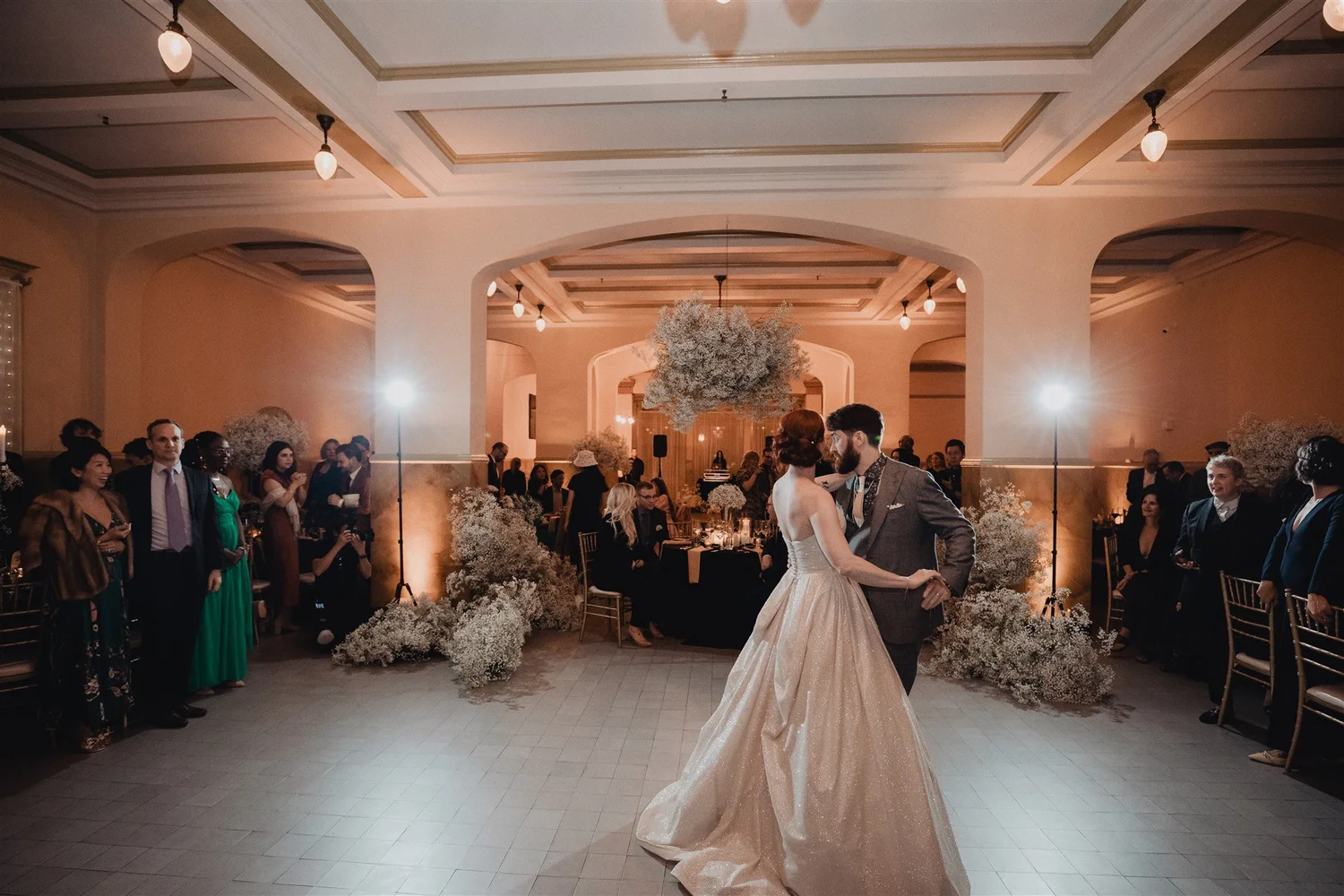 First dance in the warmly lit ballroom at Castle Green